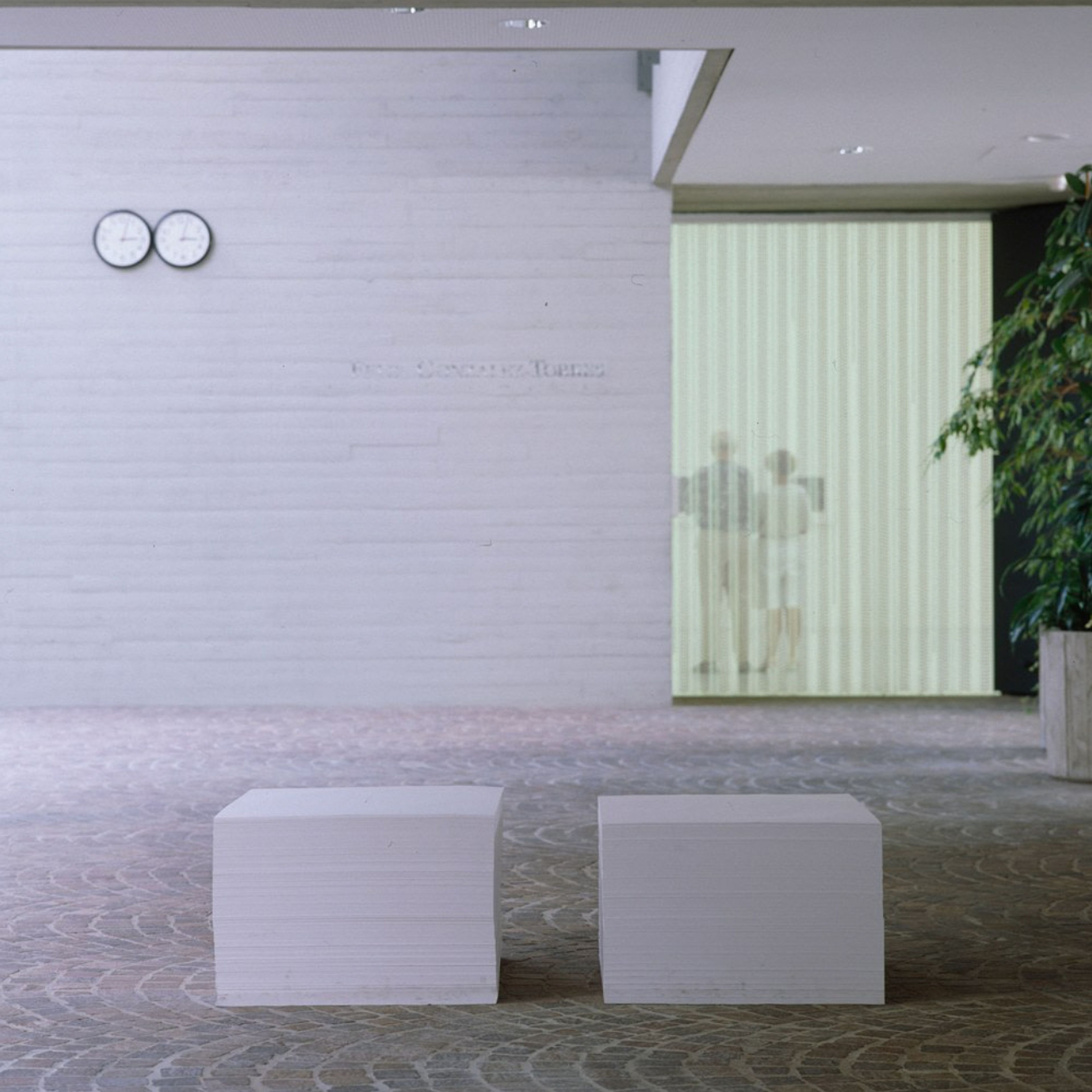 “Untitled”, 1989/1990 with “Untitled” (Perfect Lovers), 1987–1990 (upper left) installed in Felix Gonzalez-Torres, Sprengel Museum, Hannover, 1997