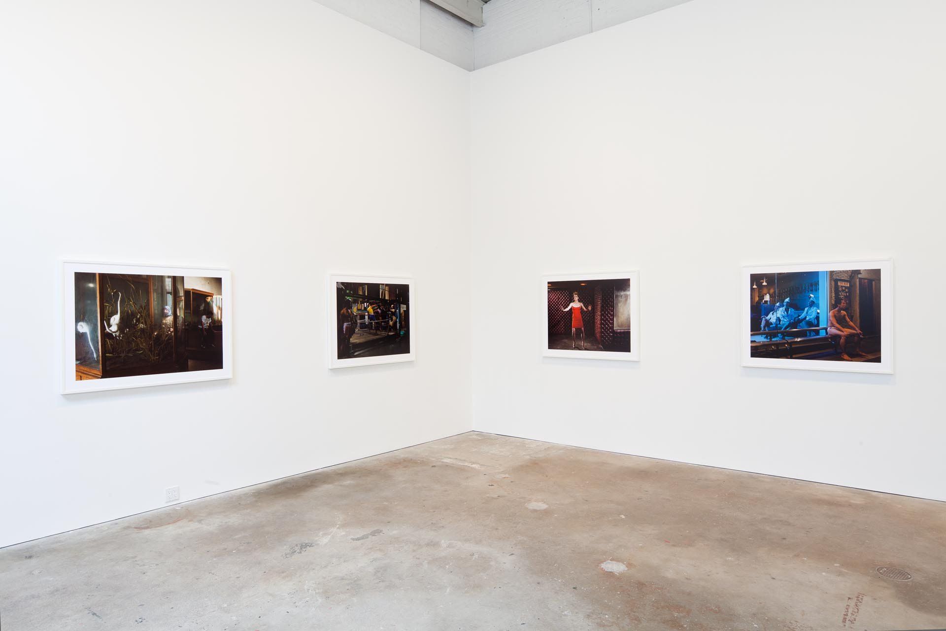 Installation view of the exhibition Philip-Lorca diCorcia: ELEVEN at David Zwirner in New York, dated 2011.