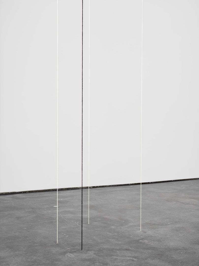 A sculpture by Fred Sandback, titled Untitled (Four-part Vertical Construction), dated 1987.