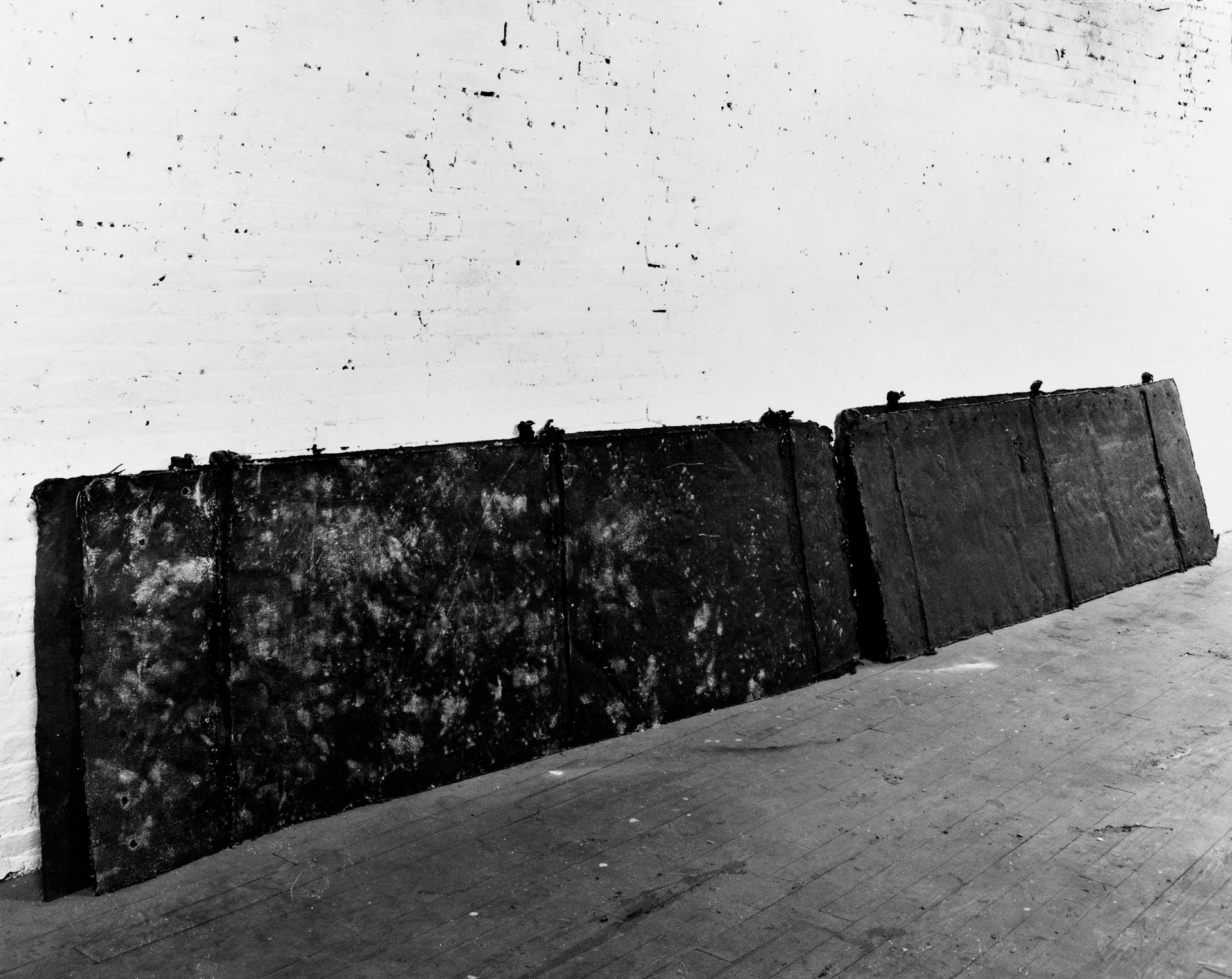 A rubber and fiberglass sculpture by Richard Serra, titled Doors, dated 1966 to 1967.