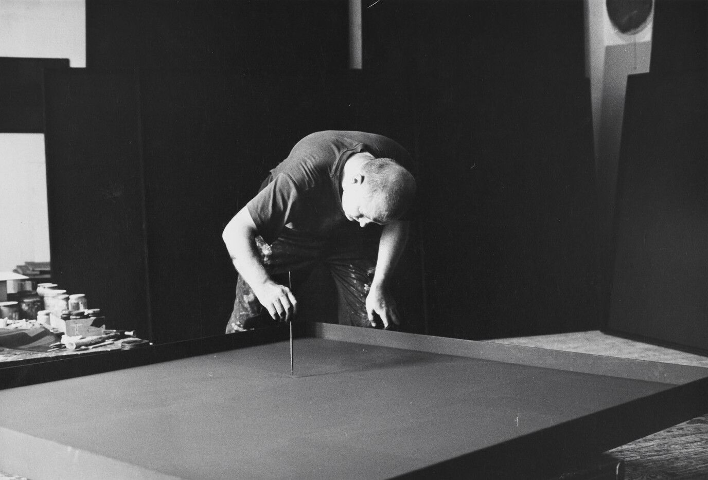 A photo of Ad Reinhardt in his studio in 1966. Photo by John Loengard.