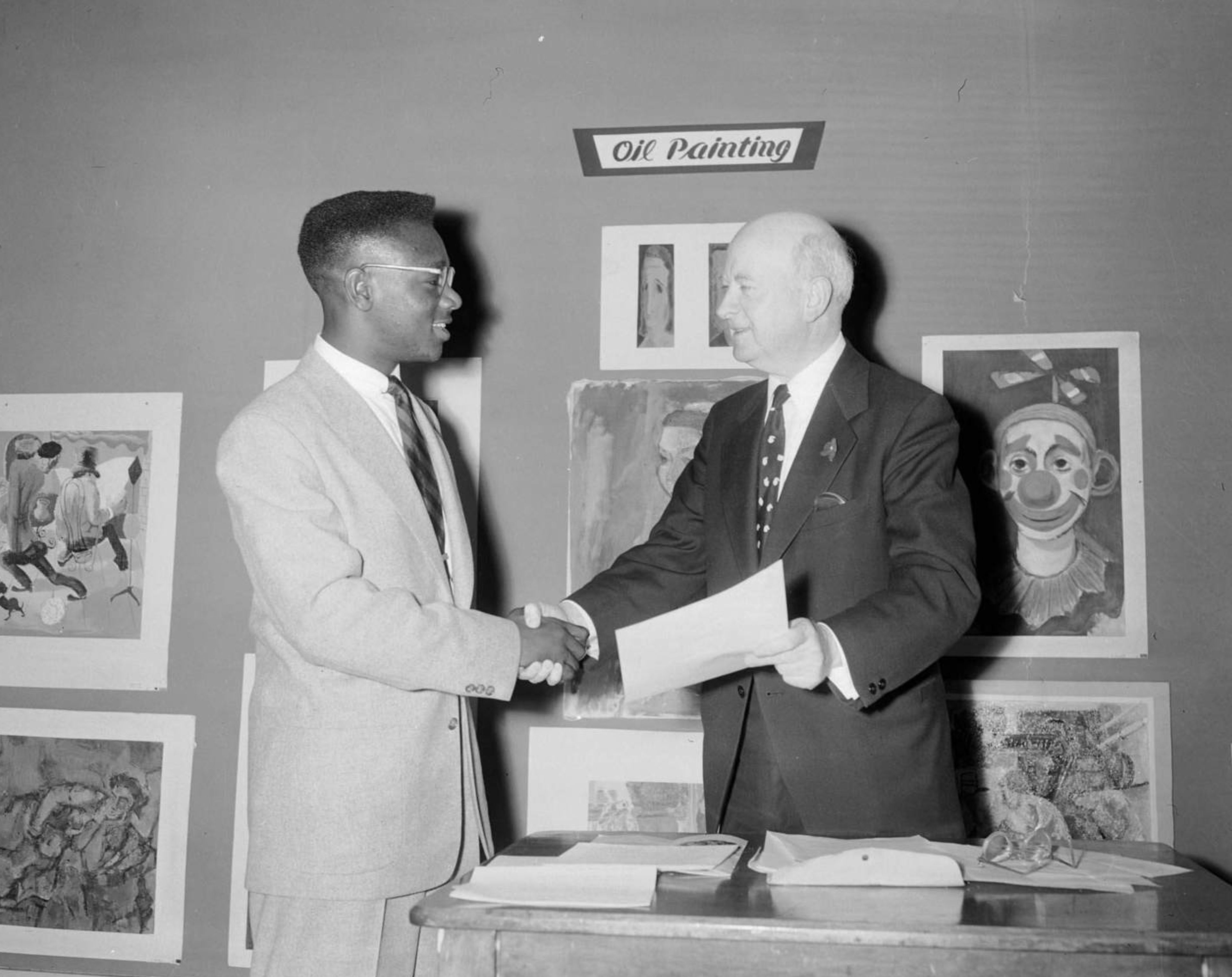 Charles “Teenie” Harris, M. R. Robinson on right presenting award to Raymond “Ray” Saunders, at National High School Art Exhibition, dated 1953. copyright Carnegie Museum of Art, Pittsburgh