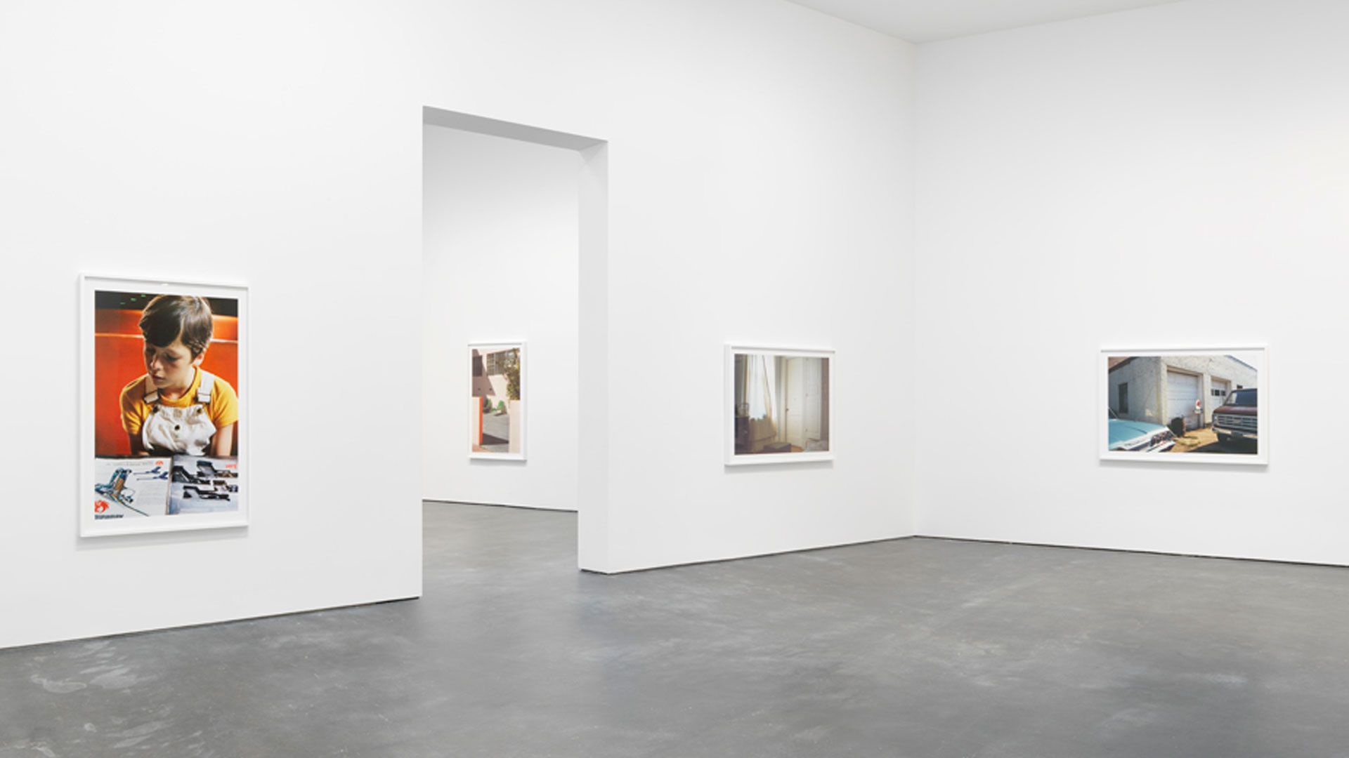 An installation view of William Eggleston's solo exhibition titled William Eggleston The Democratic Forest at David Zwirner, New York, in 2016.
