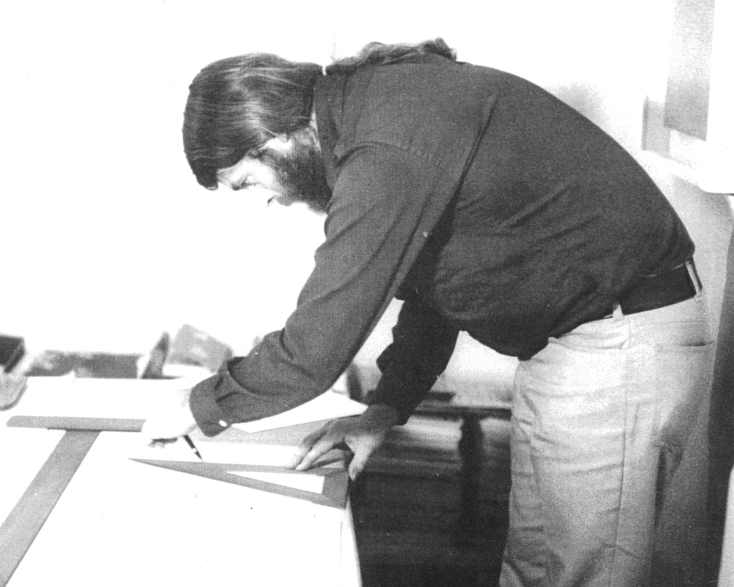 A photograph of Sandback working in his studio, dated 1990