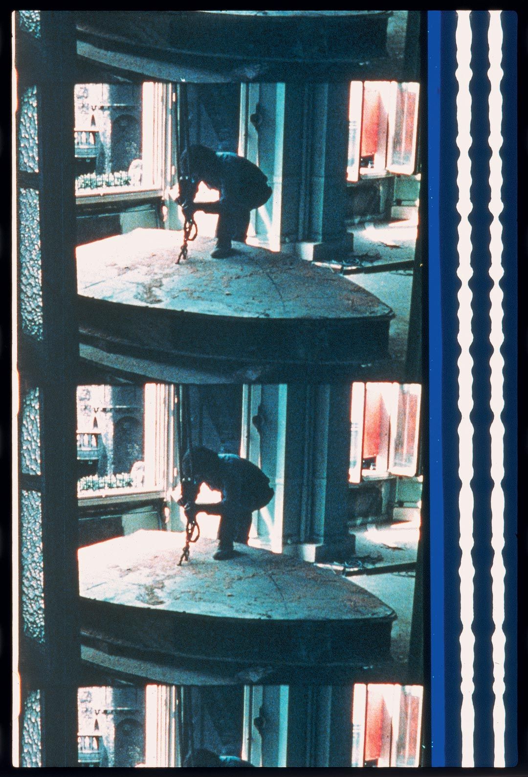 A still from a film by Gordon Matta-Clark, titled Office Baroque, dated 1977.