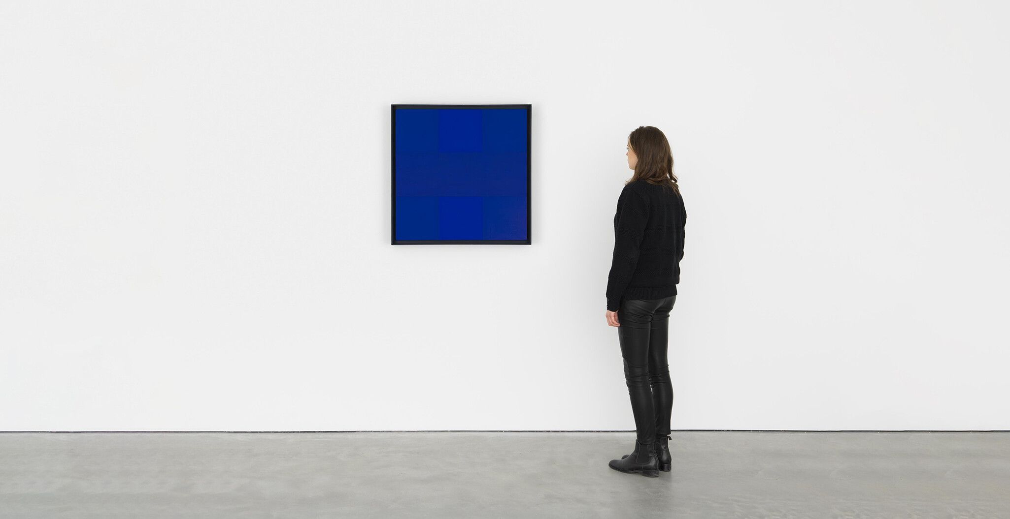 An installation view of a painting by Ad Reinhardt, titled Abstract Painting, blue, dated 1953.