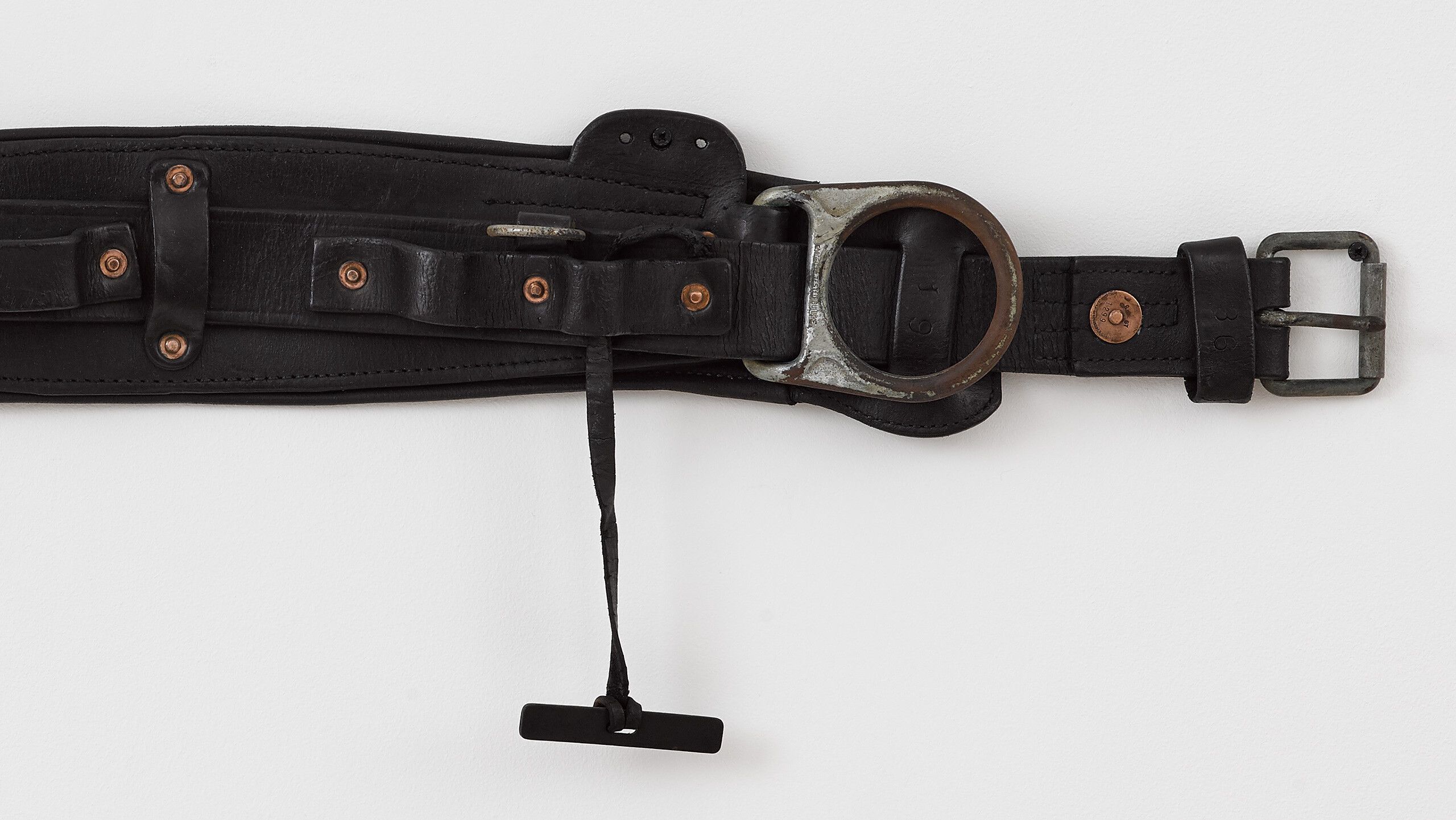 A detail of a leather harness made by Tiona Nekkia McClodden titled A.B. 5_Dull 1299, dated 2021