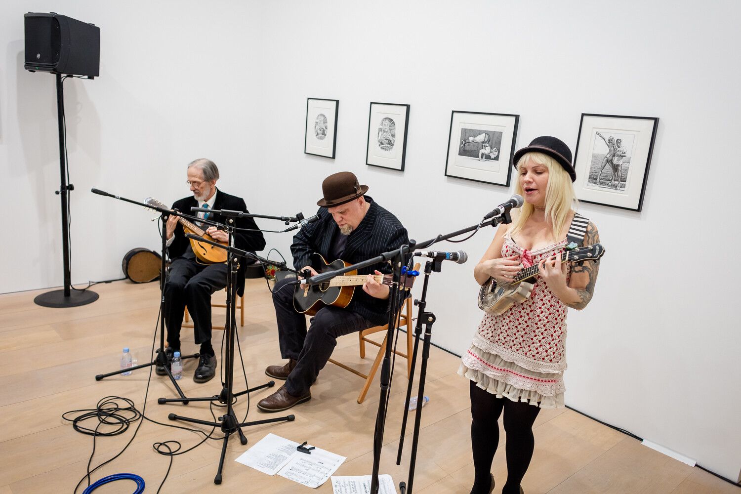 A photograph of R. Crumb performing with The East River String Band at David Zwirner London dated March 2016.
