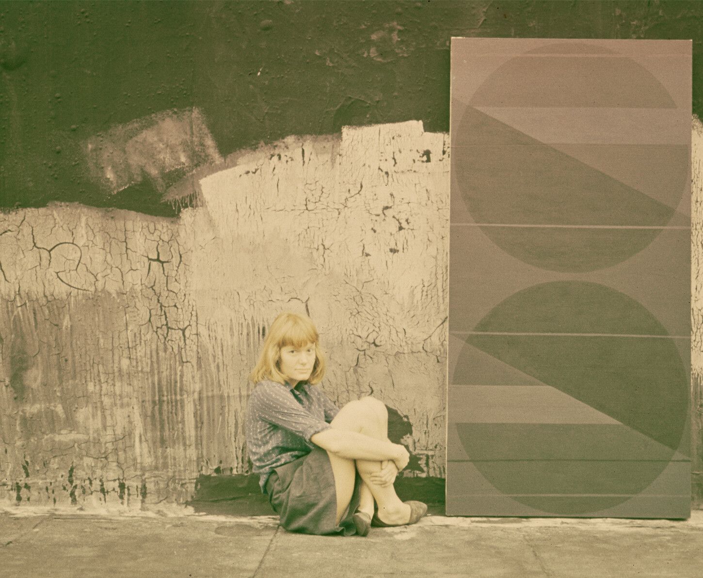 A photograph of Merrill Wagner with Untitled (1967), circa 1960s. copright Merrill Wagner Studio