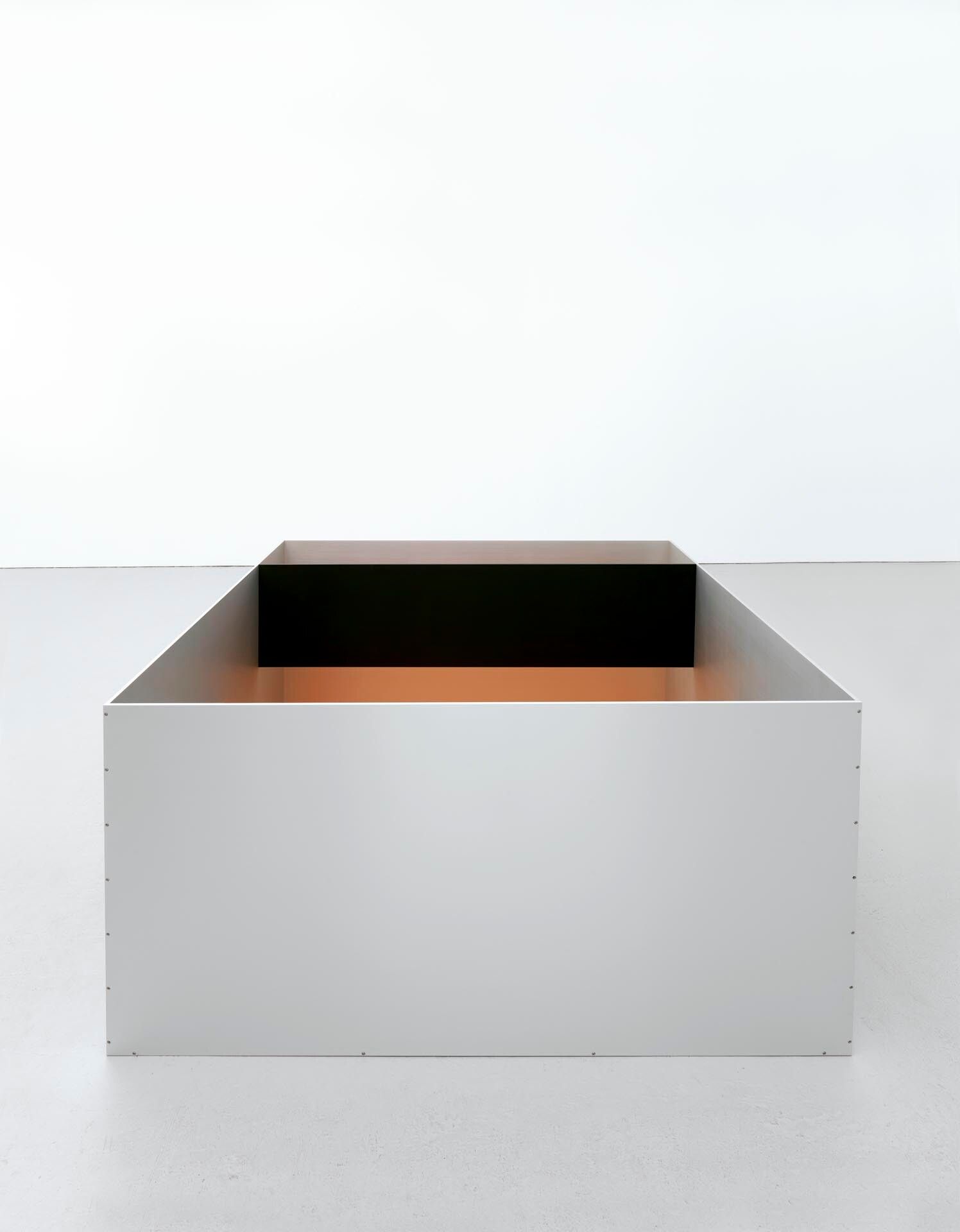 An untitled anodized aluminum and acrylic sheet sculpture by Donald Judd, dated 1989.