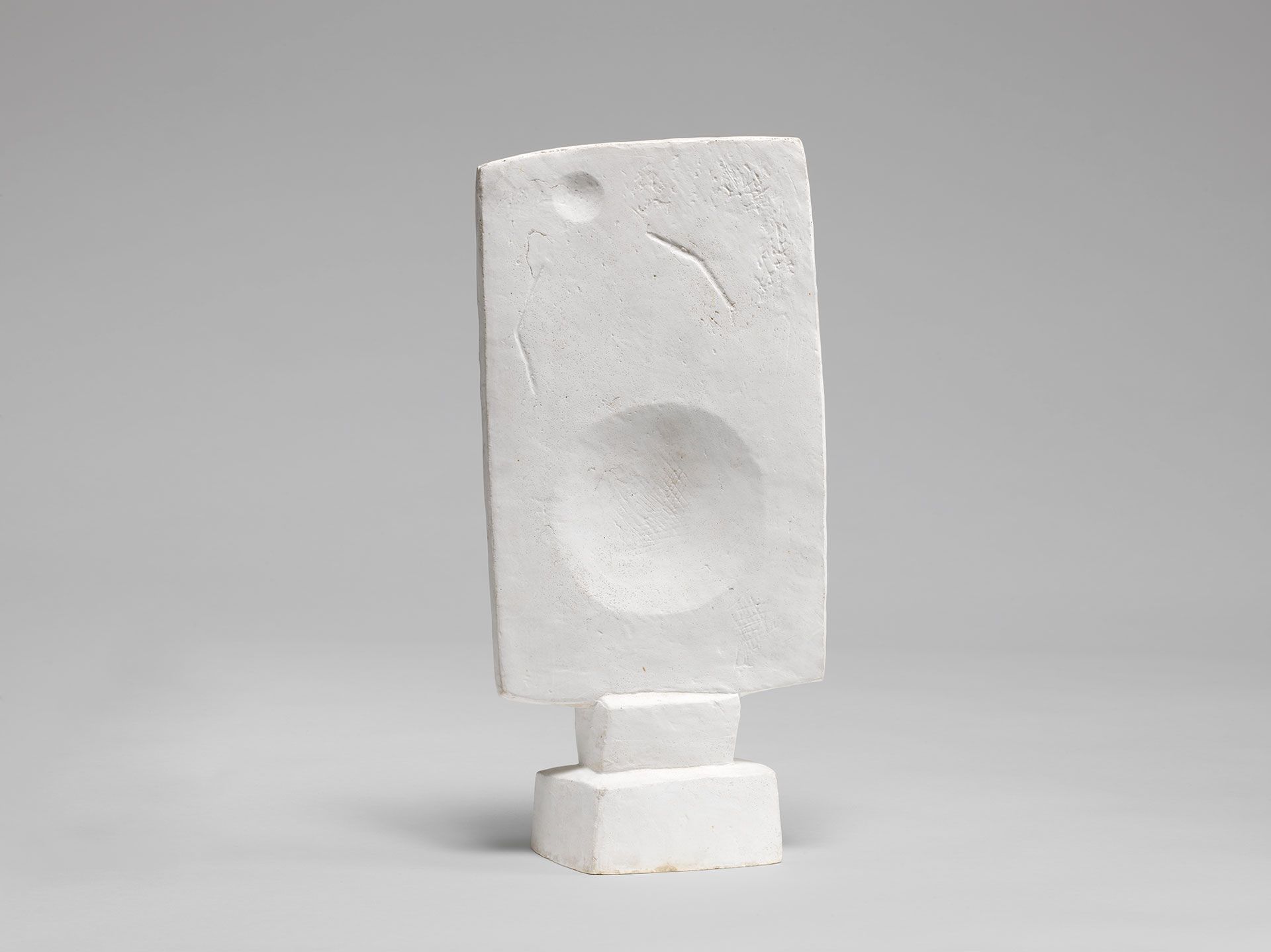A sculpture by Alberto Giacometti, titled Femme (Plat III), translated as Woman [Flat III], circa 1927 to 1929. 