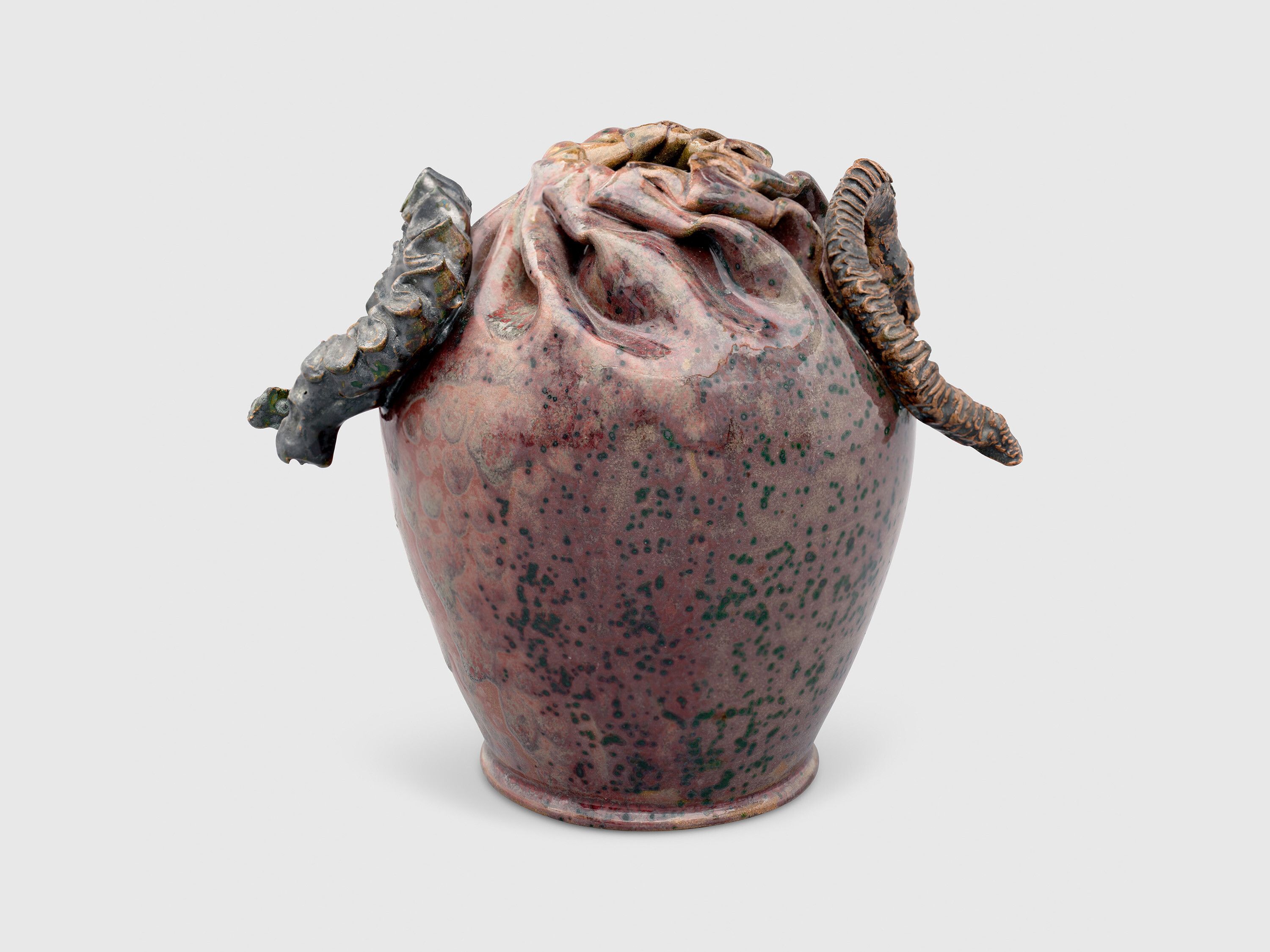 A sculpture by George Ohr, titled Vase with two snakes, dated 1897 to 1900.