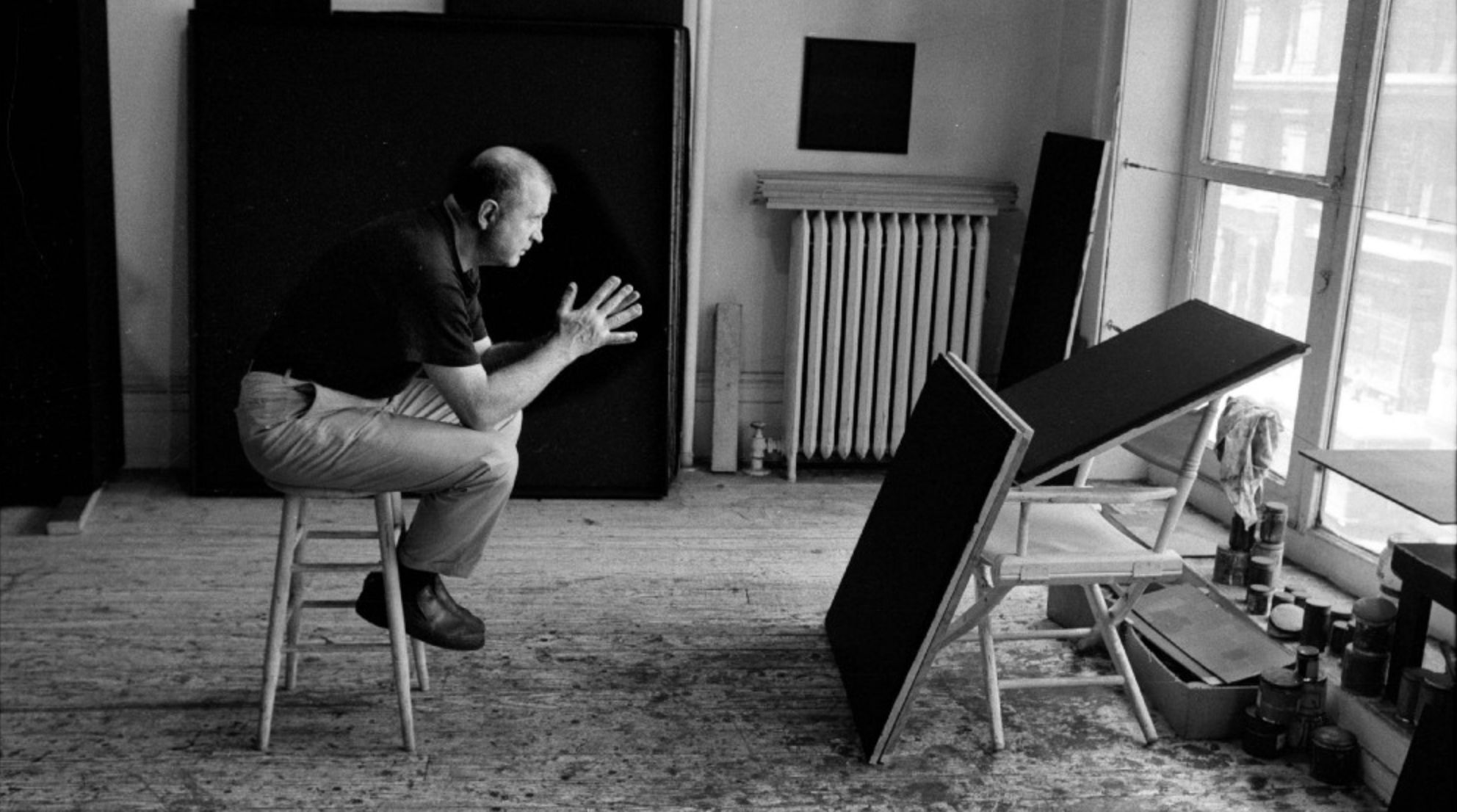 A photo of Ad Reinhardt in his studio in 1966. Photo by John Loengard.