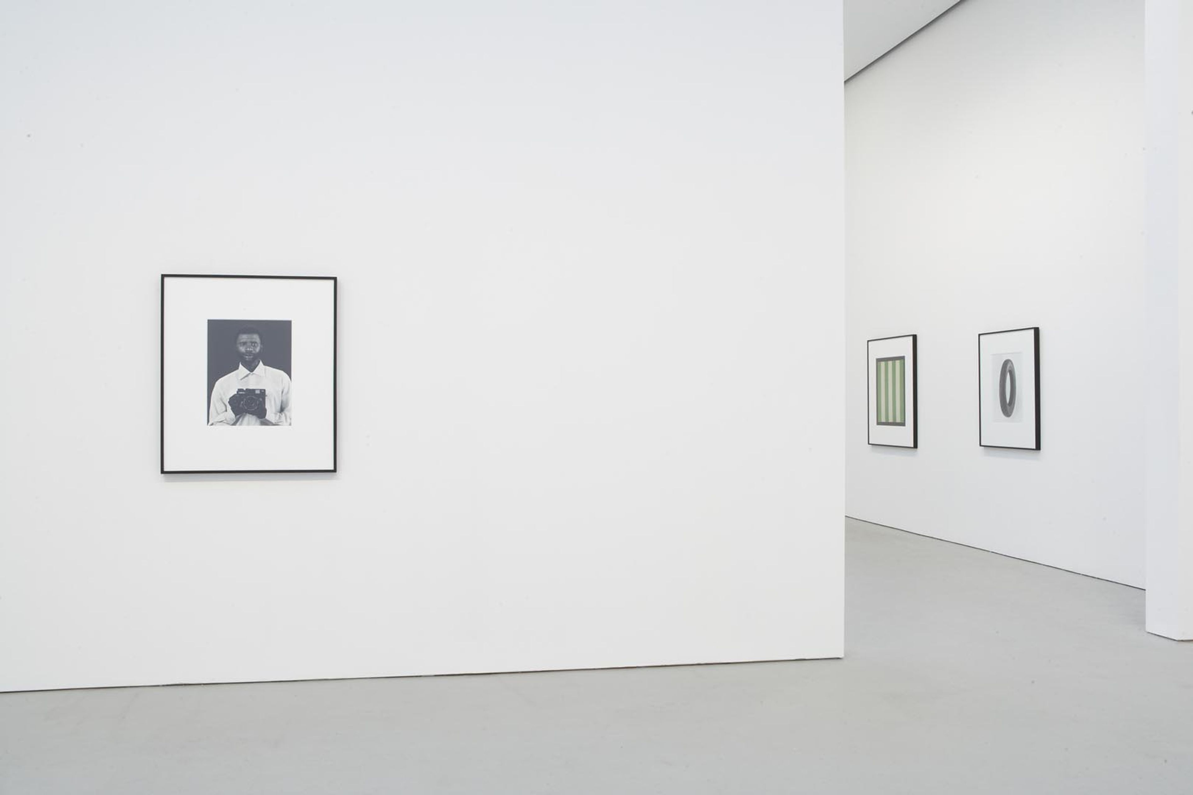 Installation view of the exhibition, For Example: Dix Huits Leçons Sur La Société Industrielle, at David Zwirner in New York, dated 2008.