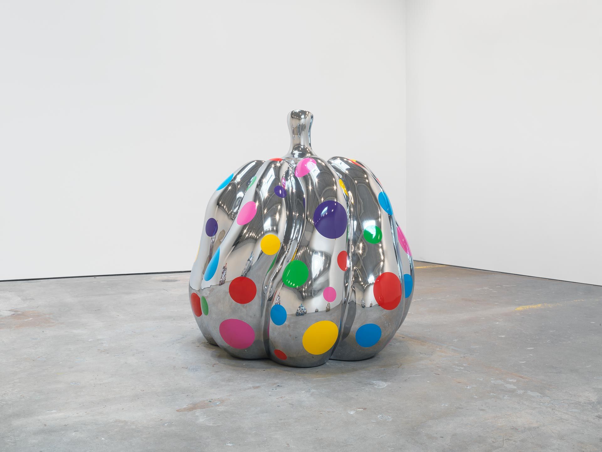 A sculpture by Yayoi Kusama, titled PUMPKIN, dated 2015.