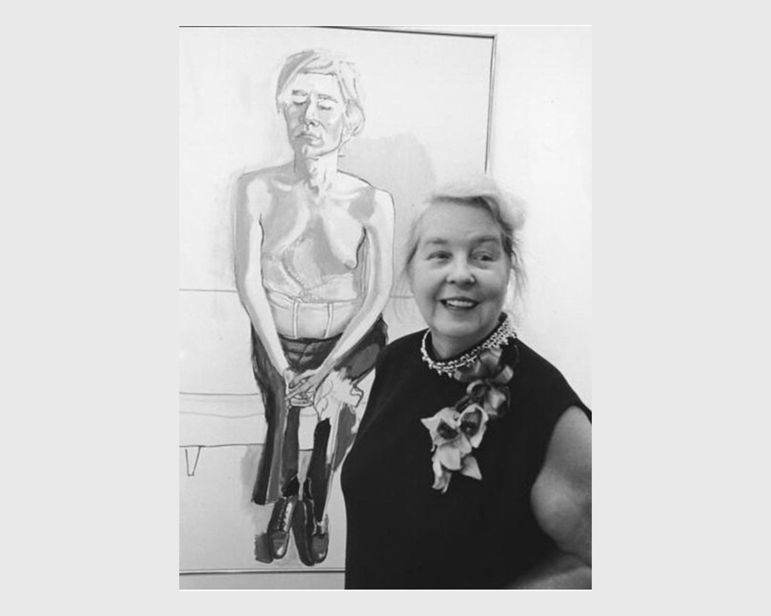 A photo of Alice Neel with her painting Andy Warhol, dated 1970. 