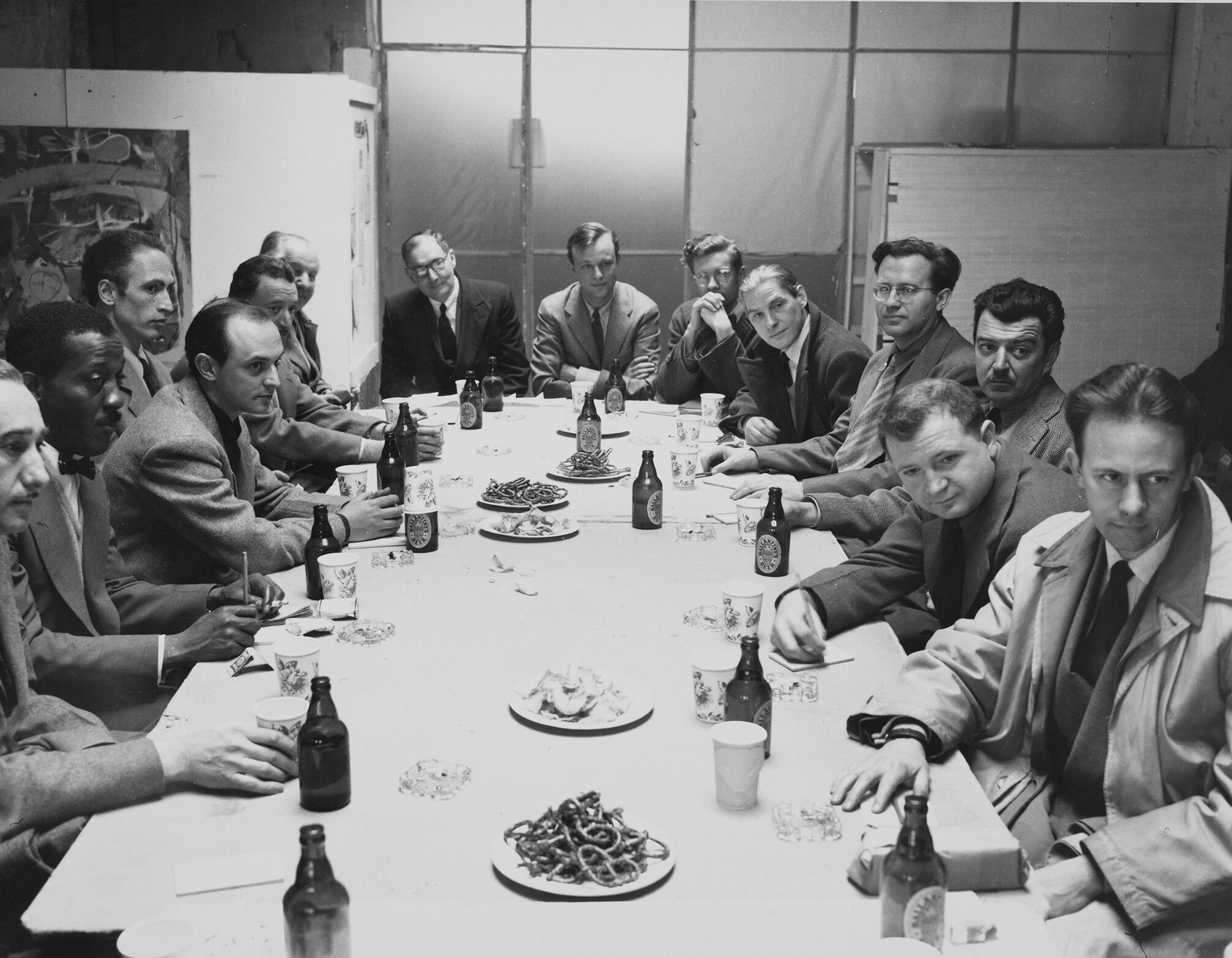 A photo of Artists’s sessions at Studio 35, AMpril 1949. Modern Artists in America edited by Robert Motherwell and Ad Reinhardt. Courtesy the Ad Reinhardt Foundation. Left to right: Seymour Lipton, Norman Lewis, Jimmy Ernst, Peter Grippe, Adolf Gottlieb, Hans Hofmann, Alfred Barr, Robert Motherwell, Richard Lippold, Willem de Kooning, Ibram Lassaw, James Brooks, Ad Reinhardt, and Richard Poussette-Dart.