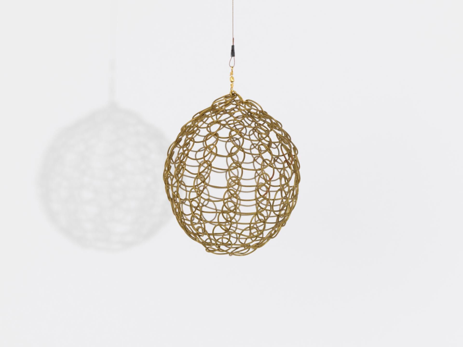 A sculpture by Ruth Asawa, titled Untitled (S.788, Hanging Sphere), dated circa 1980 to 1989.