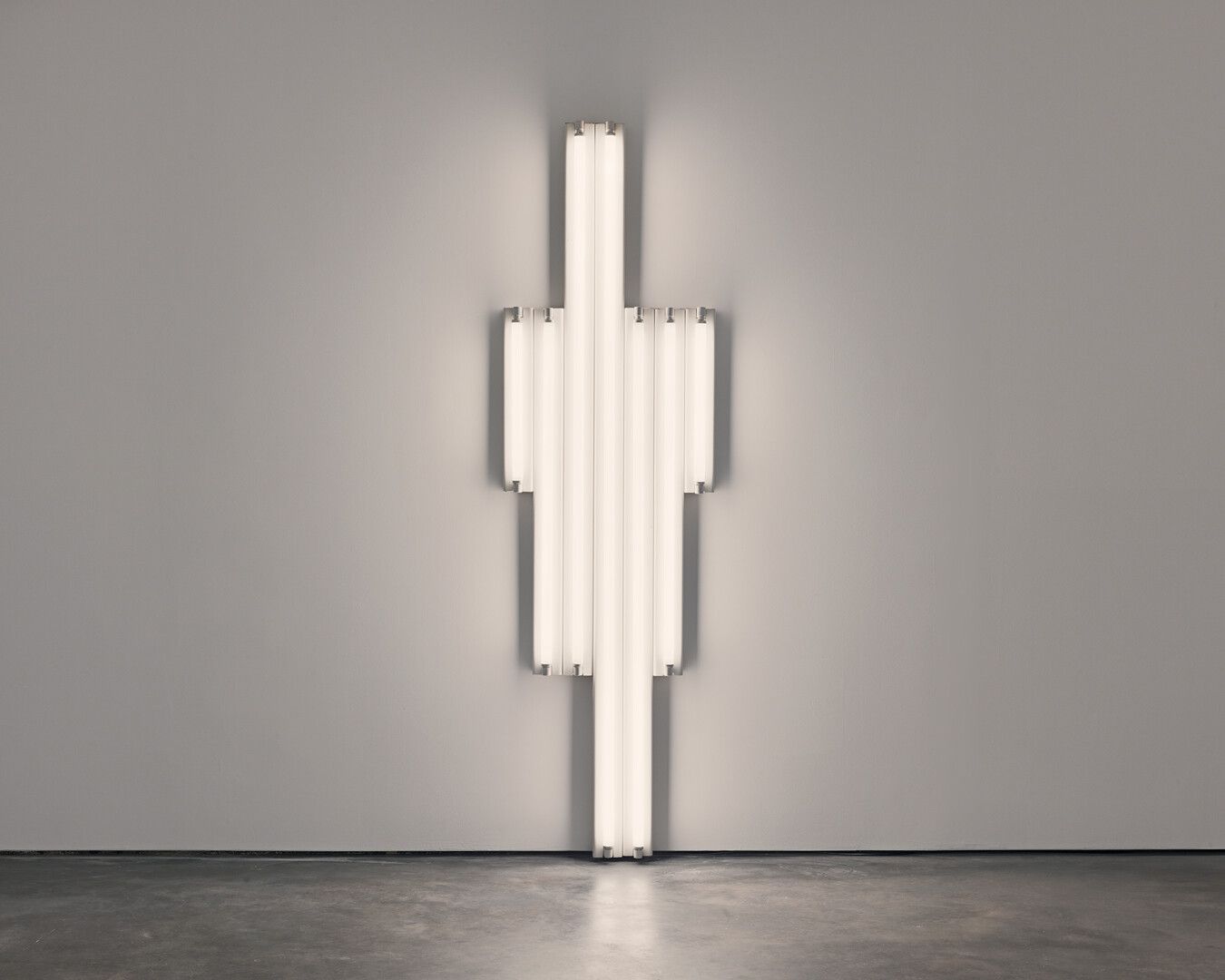 A cool white fluorescent light sculpture by Dan Flavin, titled "monument" for V. Tatlin, dated 1964.