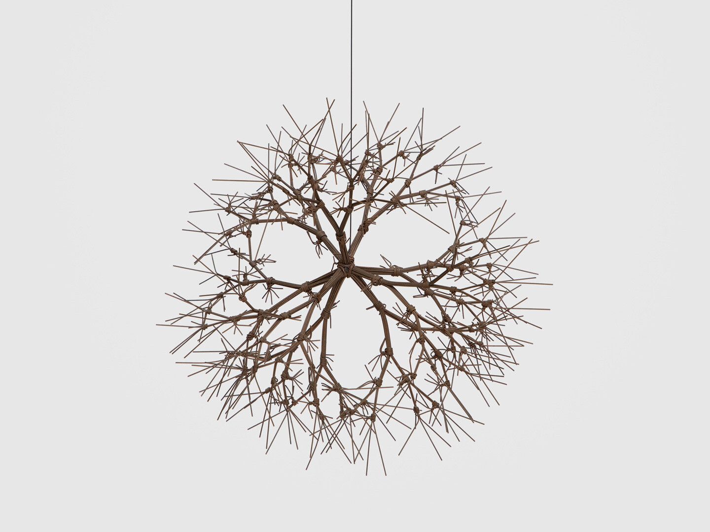 A hanging bronze wire sculpture by Ruth Asawa, titled Untitled (S.371, Hanging, Tied-Wire, Closed-Center, Multi-Branched Form Based on Nature), dated 1965.