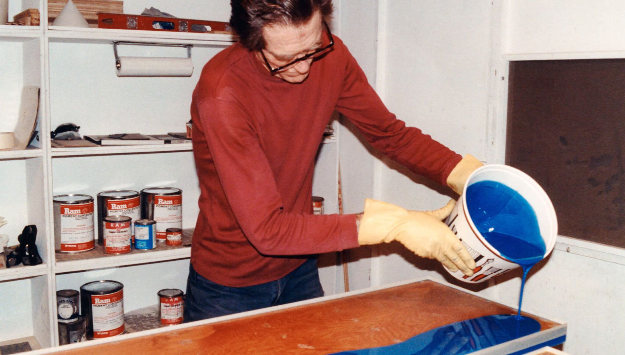 A photograph of John Mccracken in the studio