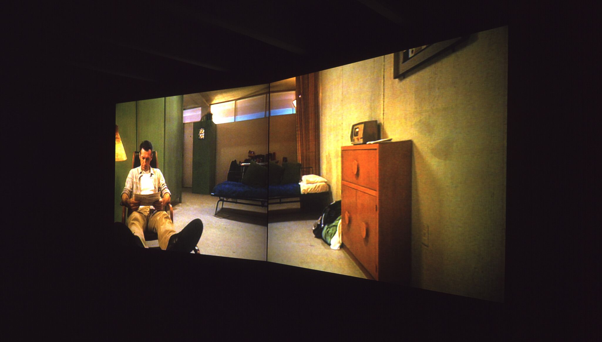 An installation view of Stan Douglas’s Win, Place or Show, dated 1998 at the exhibition titled Stan Douglas and Douglas Gordon: Double Vision in Dia Chelsea, New York, 1999–2000