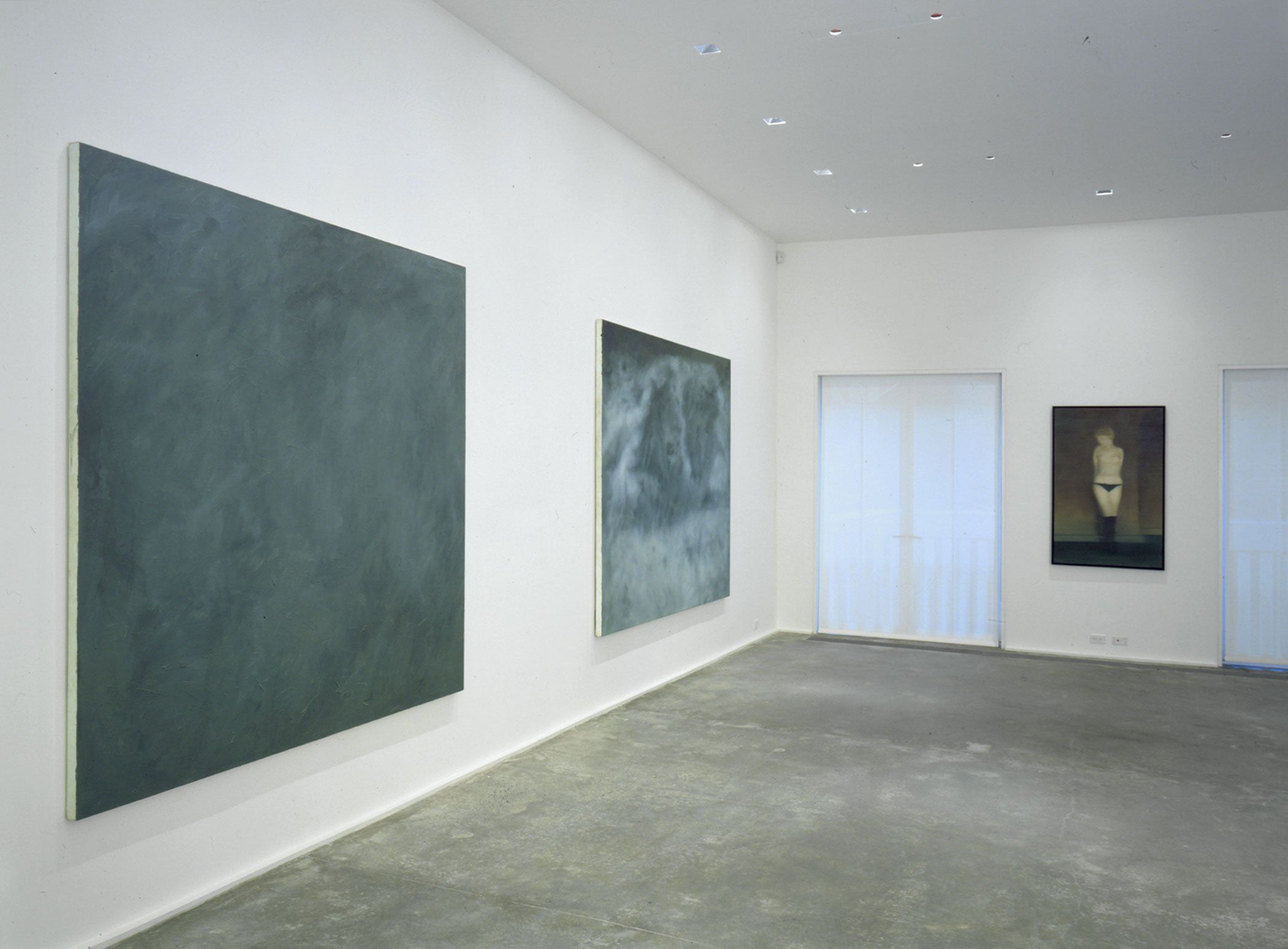An installation view of the exhibition Gerhard Richter: Early Paintings, at David Zwirner New York, dated 2000.