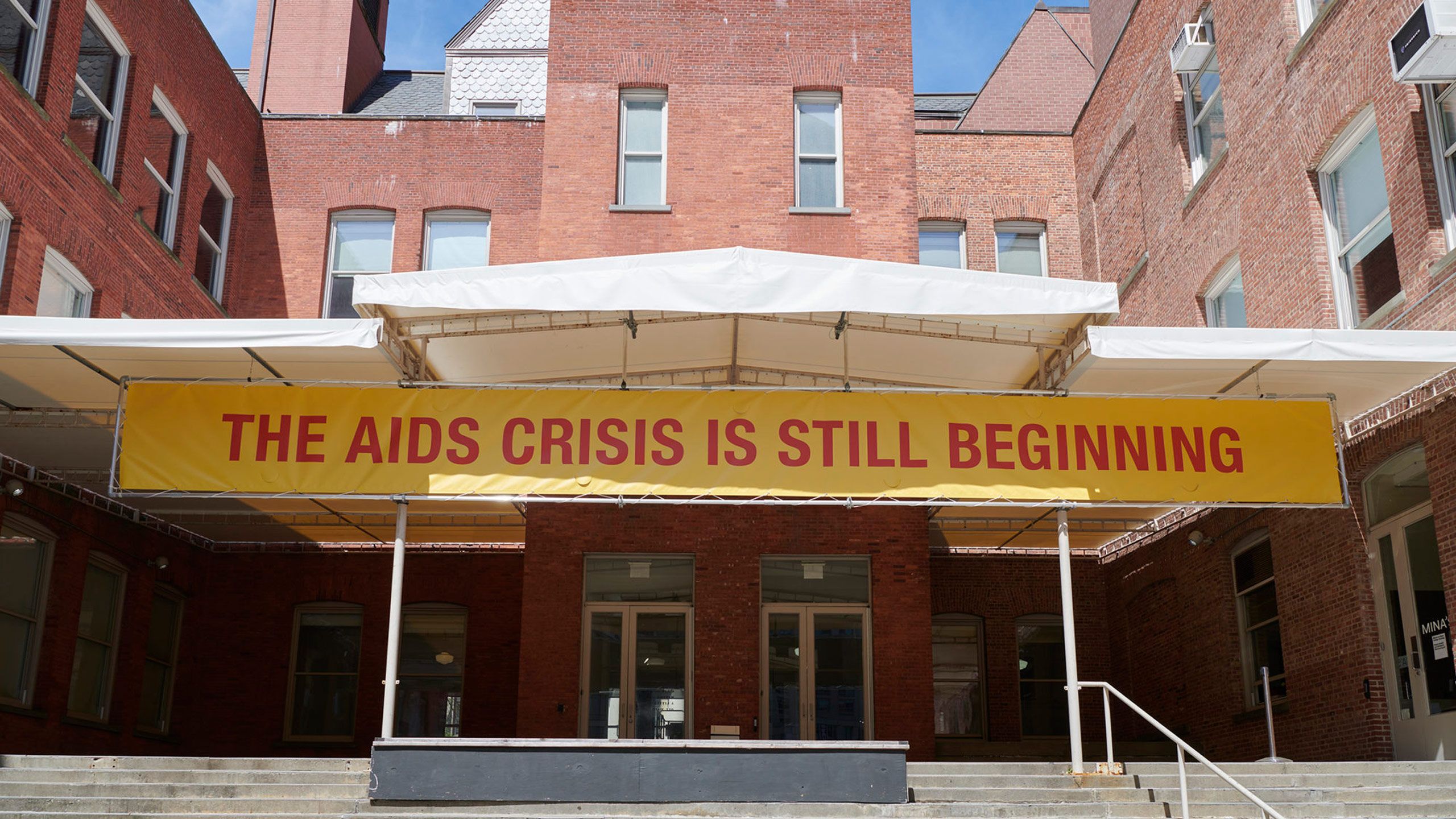 An installation view of a work by Gregg Bordowitz, titled The AIDS Crisis is Still Beginning, at MoMA PS1 in New York, in 2021.