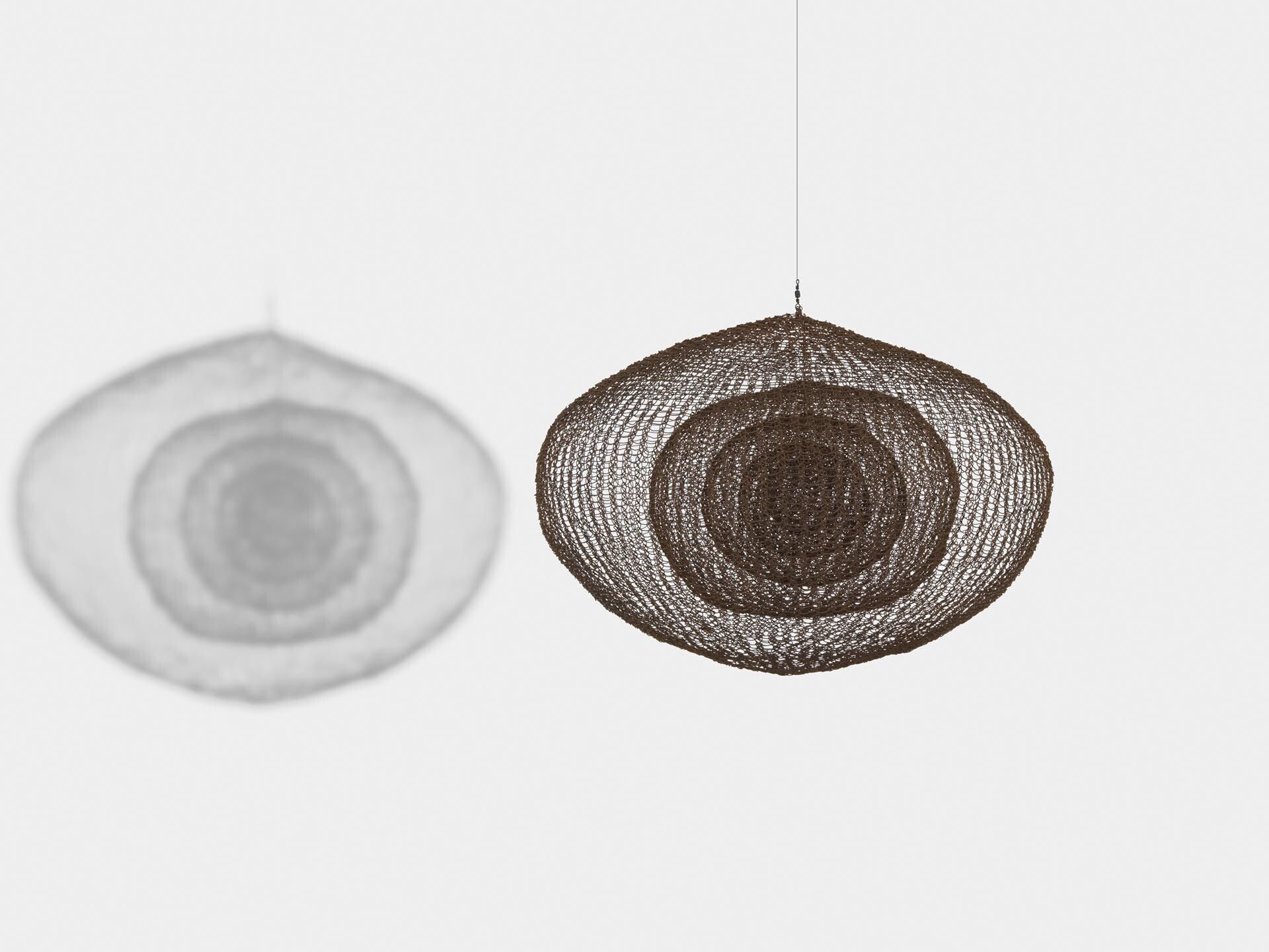 A sculpture by Ruth Asawa, titled Untitled (S.461, Hanging Singled-Lobed, Five Layers of Spheres), dated 1954.
