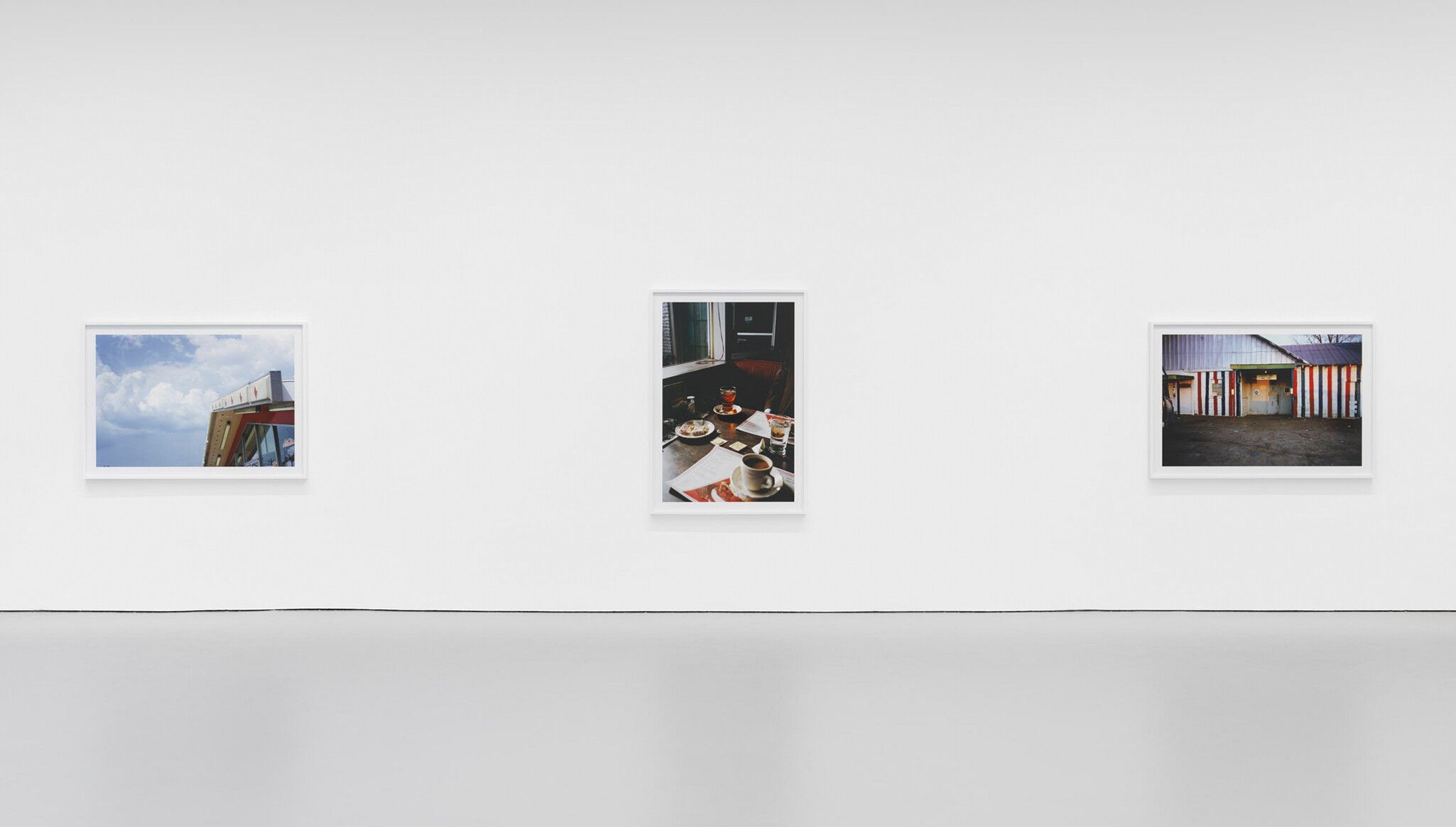 Installation view of the exhibition William Eggleston: The Outlands, at David Zwirner in New York, 2022