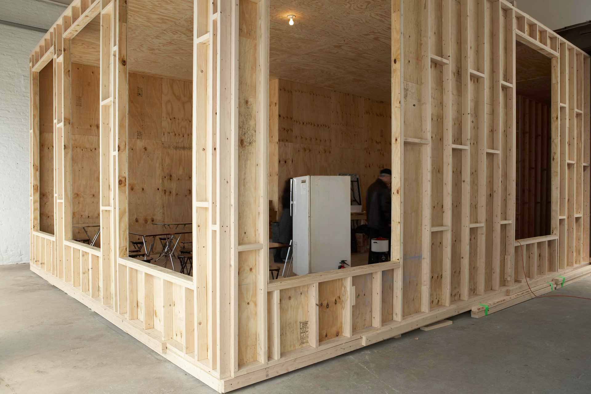 A mixed media installation by Rirkrit Tiravanija titled Untitled 1992 (Free), dated 1992 to 2007.