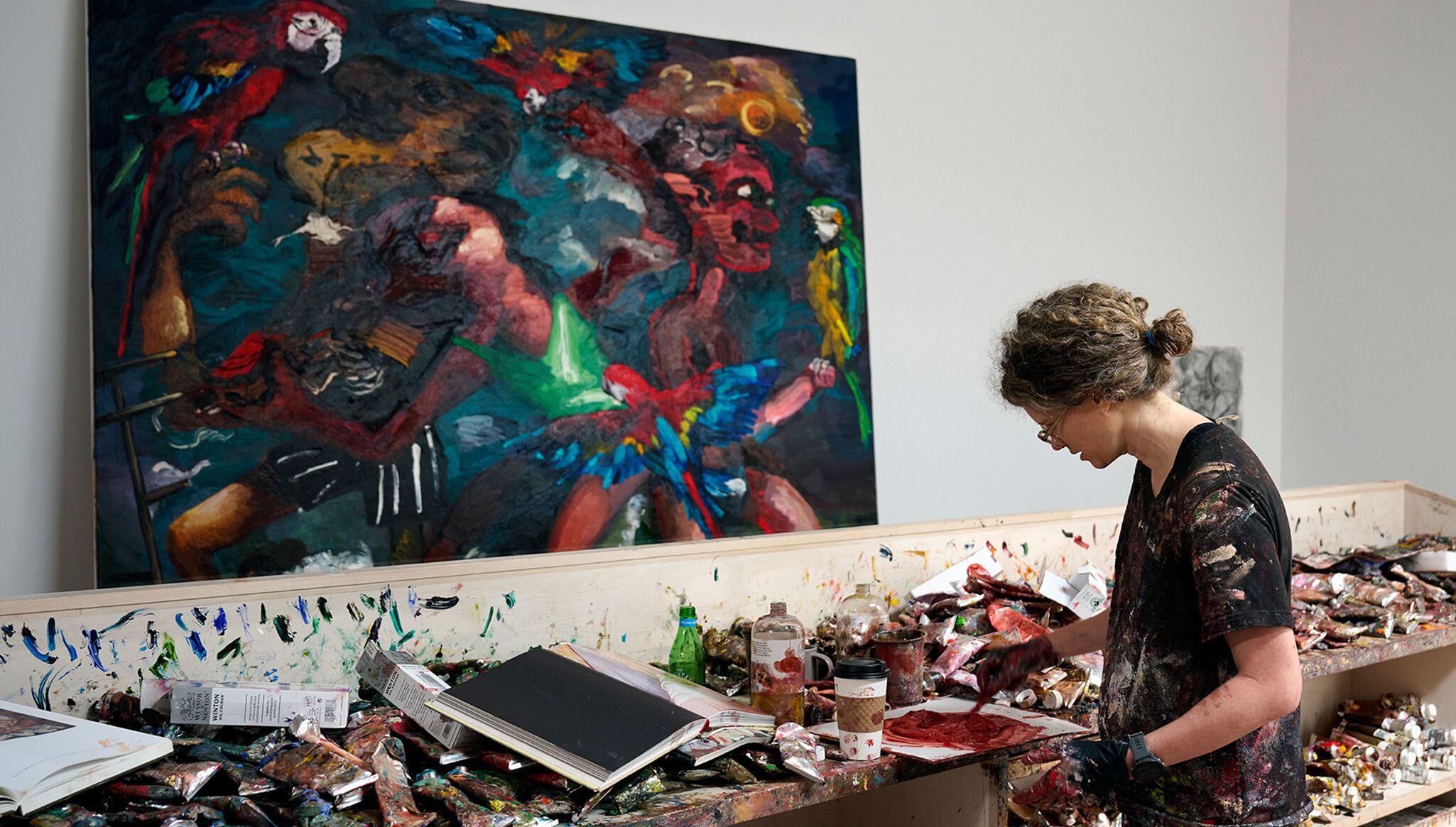 A photo of Dana Schutz in her studio, 2023. Photo by Jason Schmidt