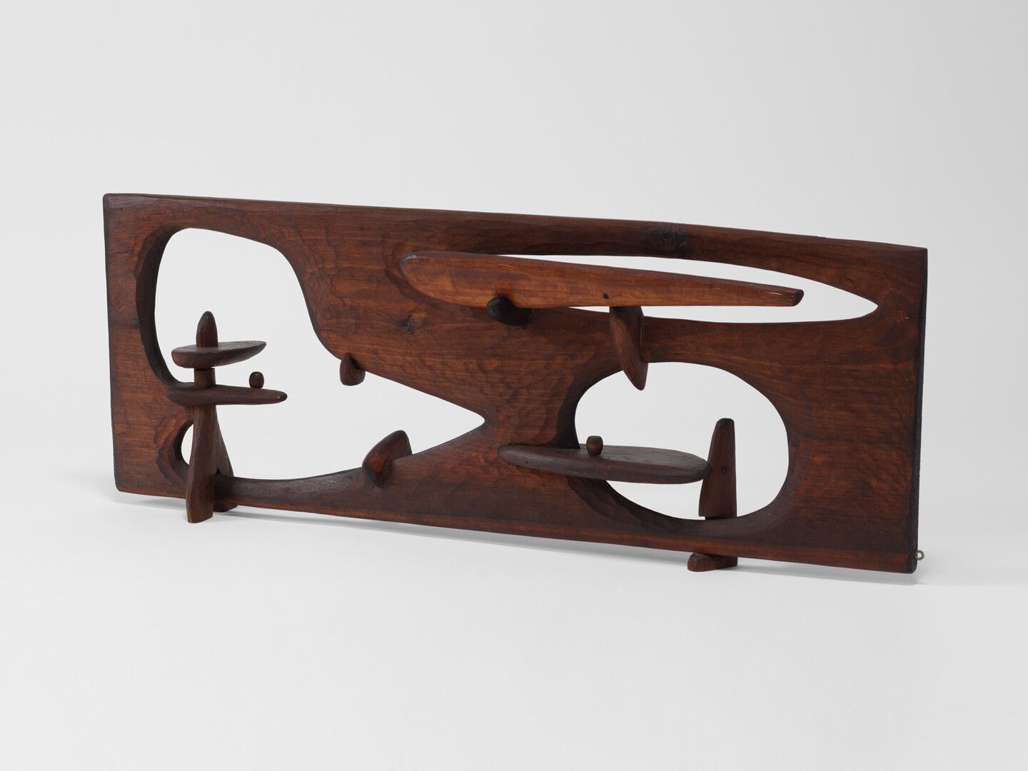 An untitled wood sculpture by Leo Amino, dated 1956. 