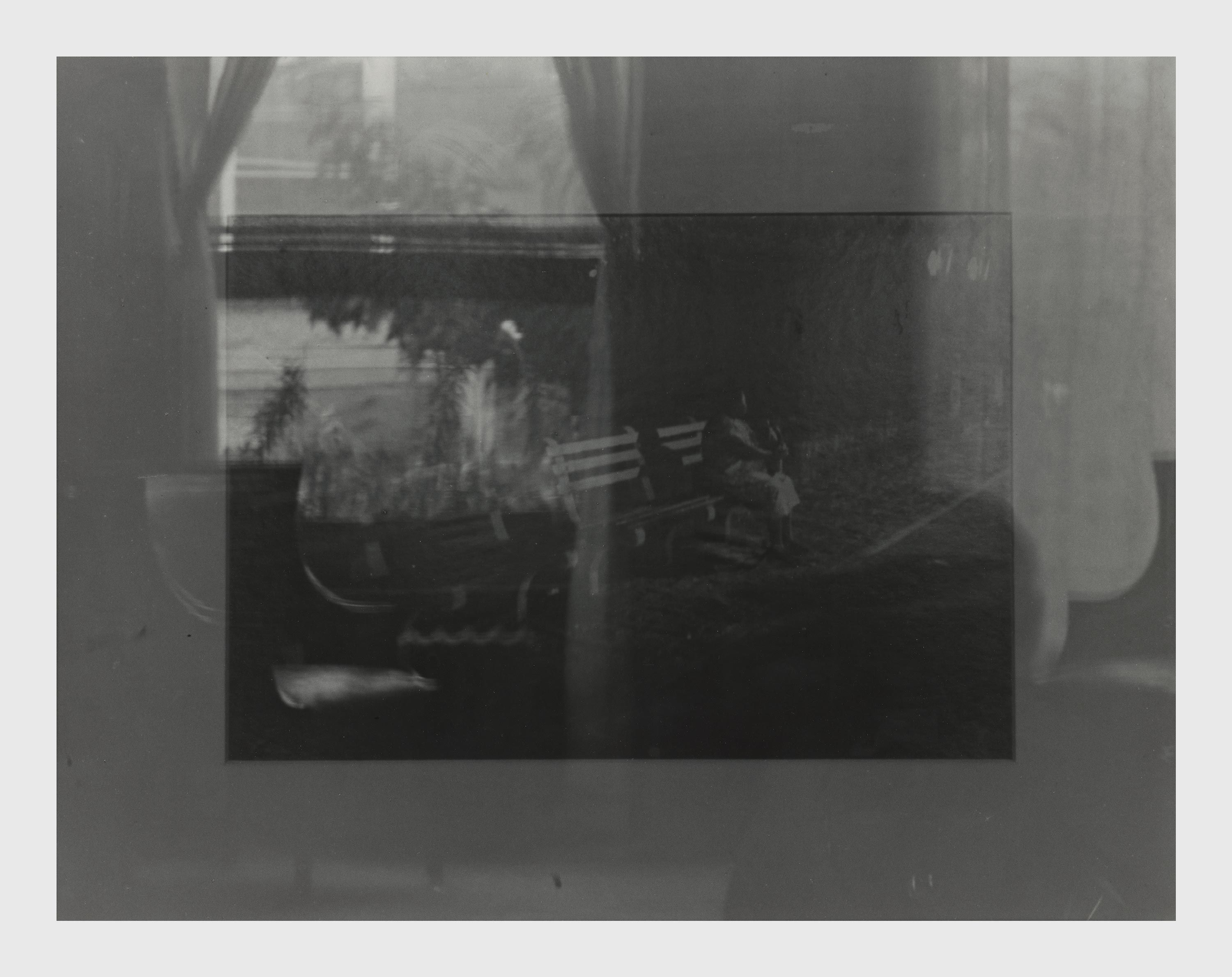 A photograph by Roy DeCarava, titled Reflection, dated 1986.