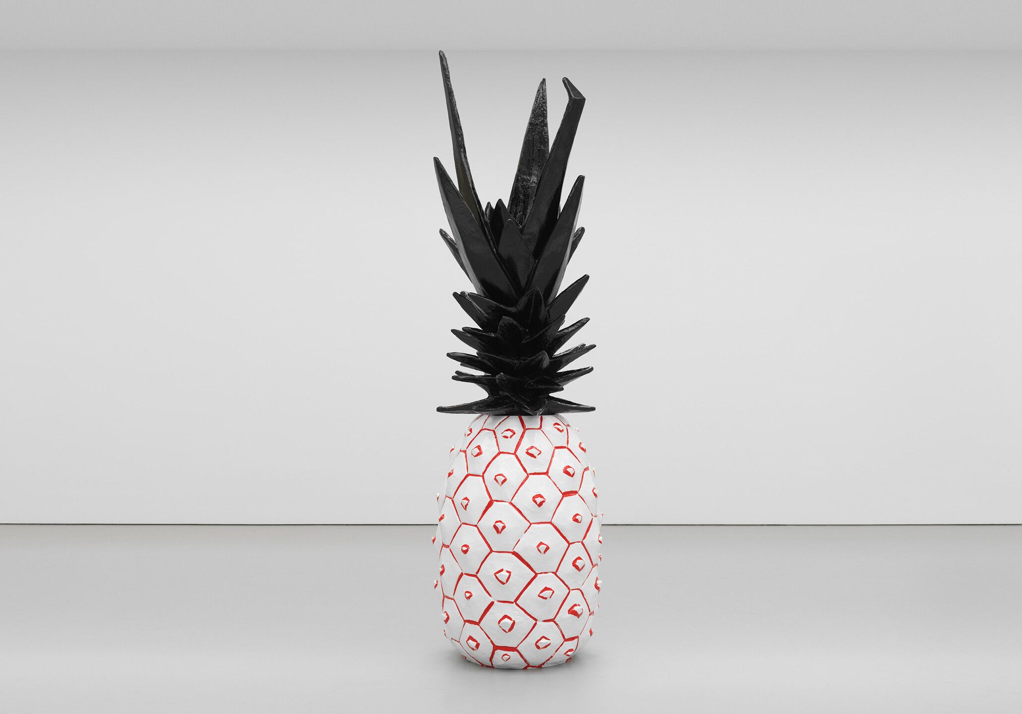 A painted bronze sculpture in two parts by Rose Wylie, titled Pineapple, dated 2020.