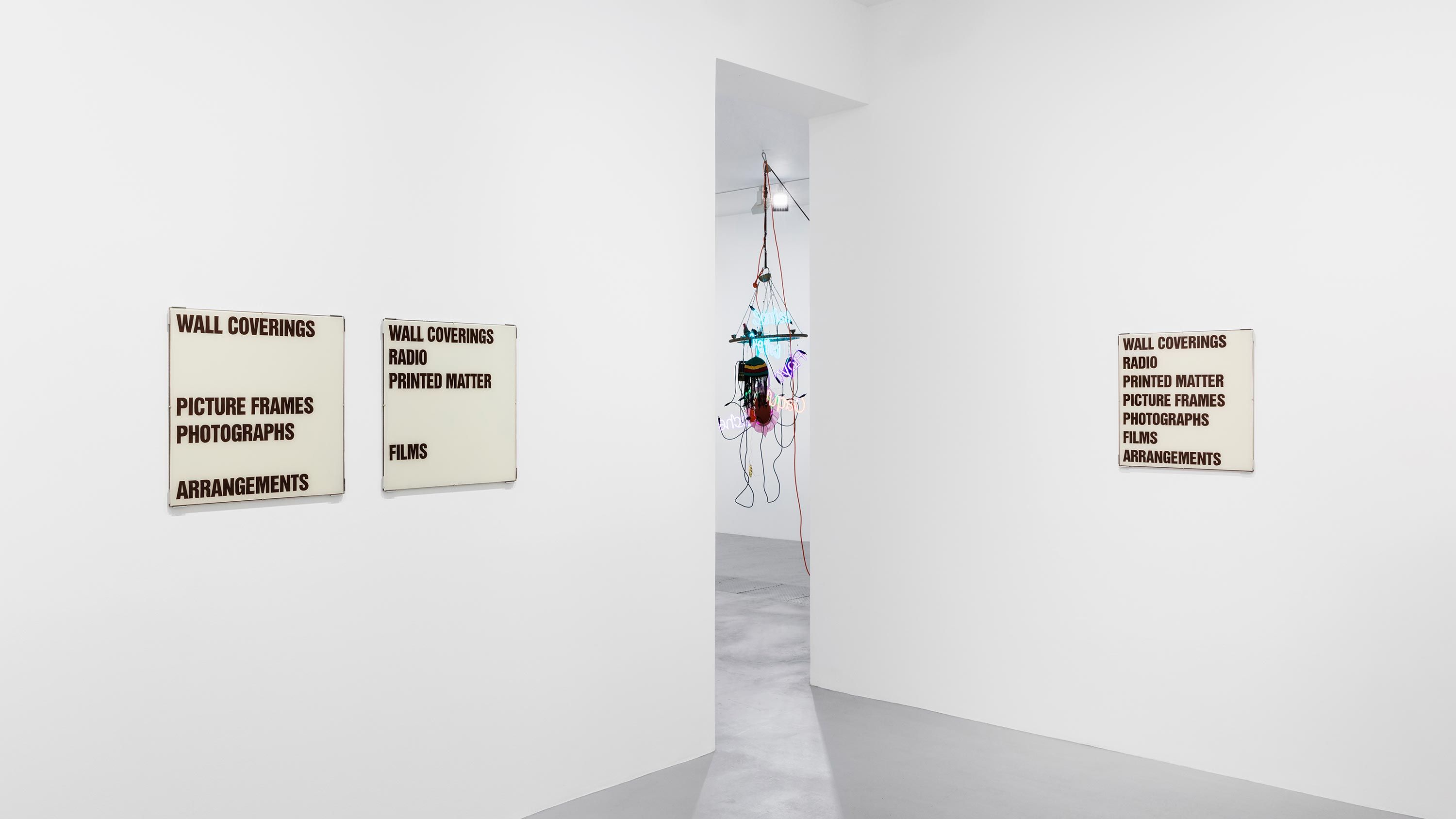 Installation view, Program, David Zwirner, Paris, 2021, featuring works, from left, by Christopher Williams and Jason Rhoades