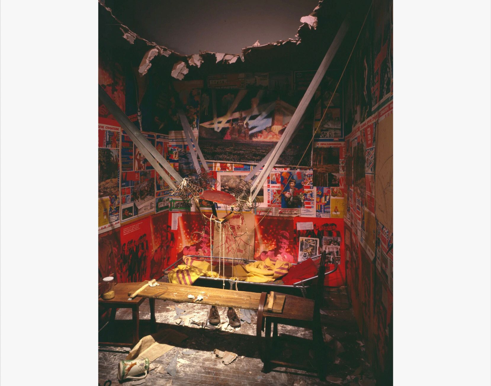 An installation by Ilya Kabakov, titled The Man Who Flew To Space from His Apartment, dated 1984.