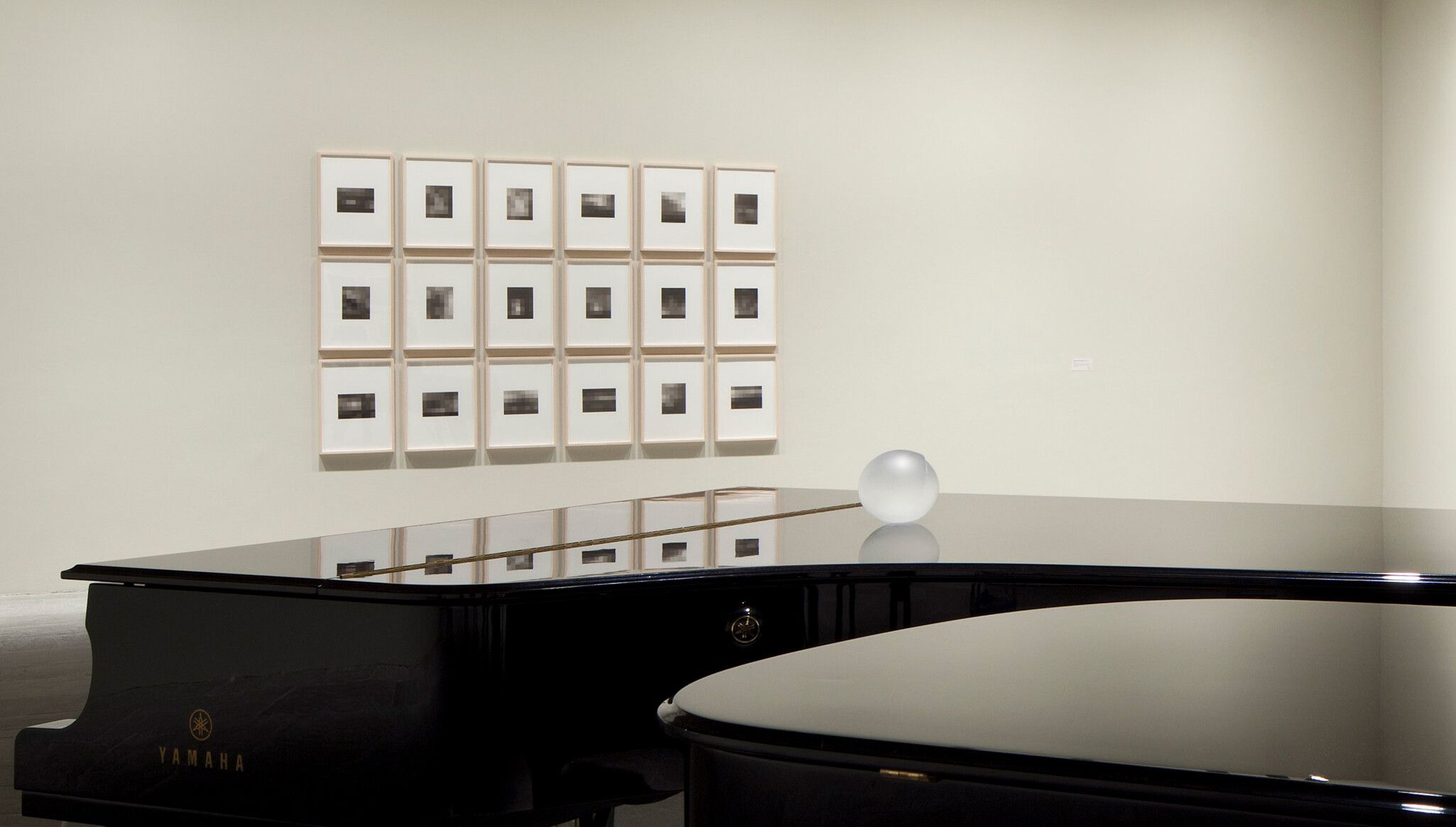 A Photo by Sheldan C. Collins of An Installation view, Sherrie Levine’s, Equivalents (After Stieglitz): 1-18 (2006), on view in Sherrie Levine: MAYHEM, The Whitney Museum of American Art, New York, dated 2012.