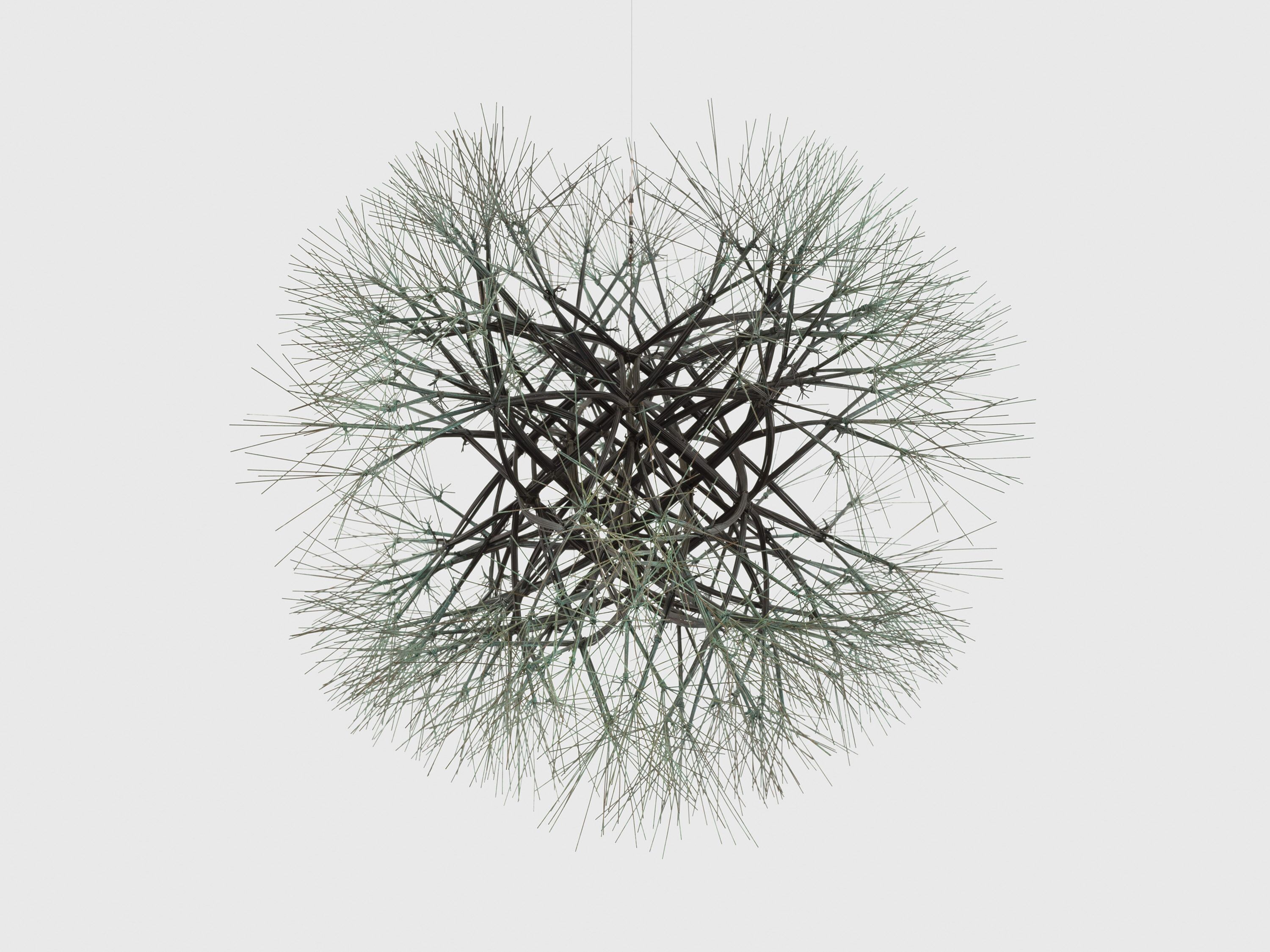 A hanging sculpture—bronze wire with green patina artwork by Ruth Asawa, titled Untitled (S.043, Hanging Tied-Wire, Cubed Open-Center, Multi-Branched Form Based on Nature), circa 1994.