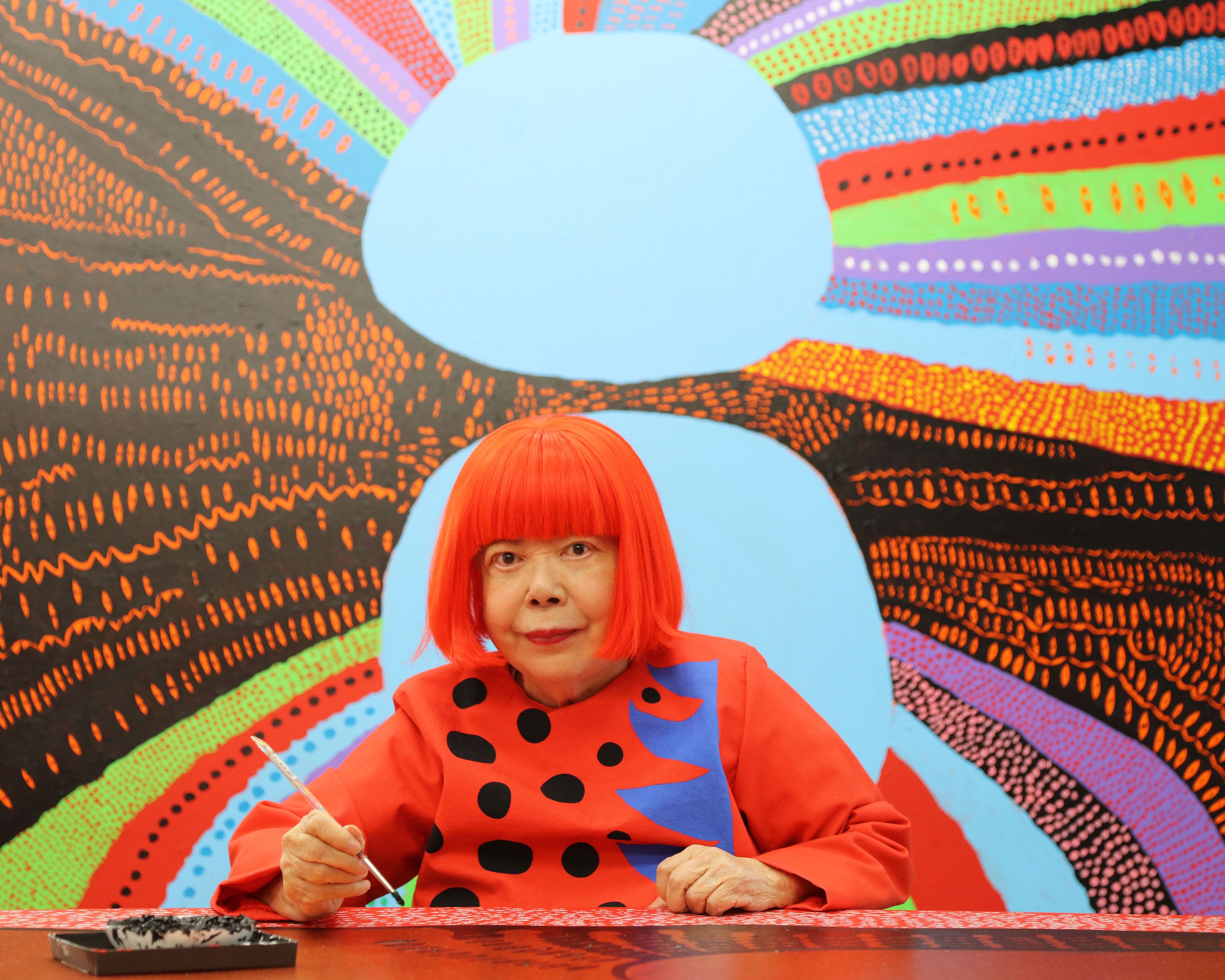 A portrait of Yayoi Kusama