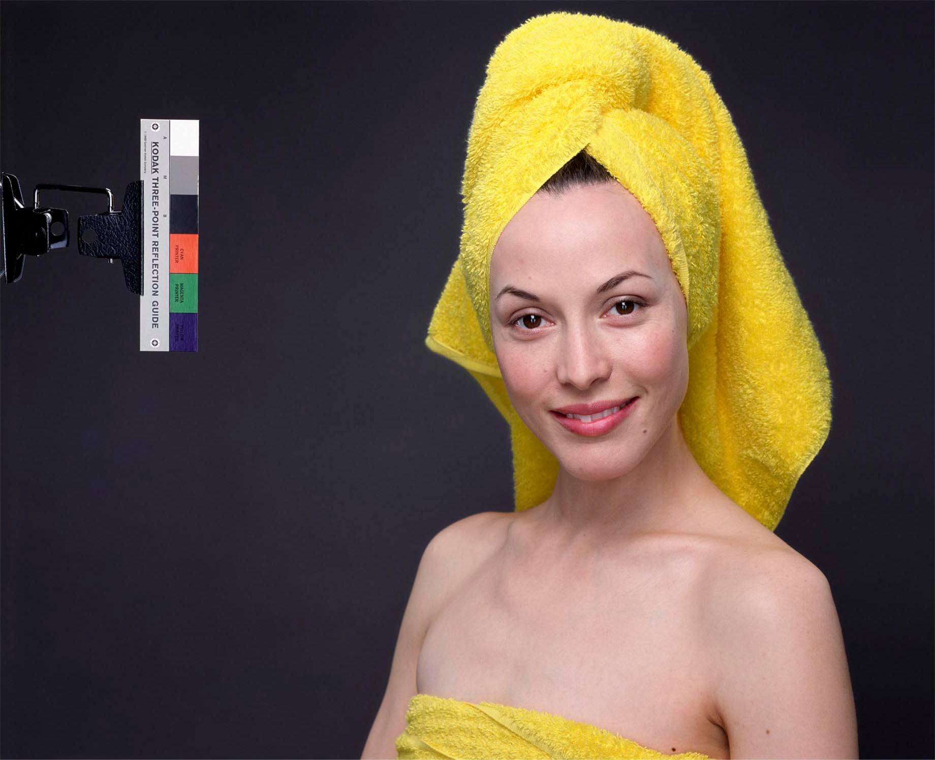 A photograph by Christopher Williams, titled Kodak Three Point Reflection Guide, © 1968 Eastman Kodak Company, 1968. (Meiko smiling), Vancouver, B. C., dated 2005.