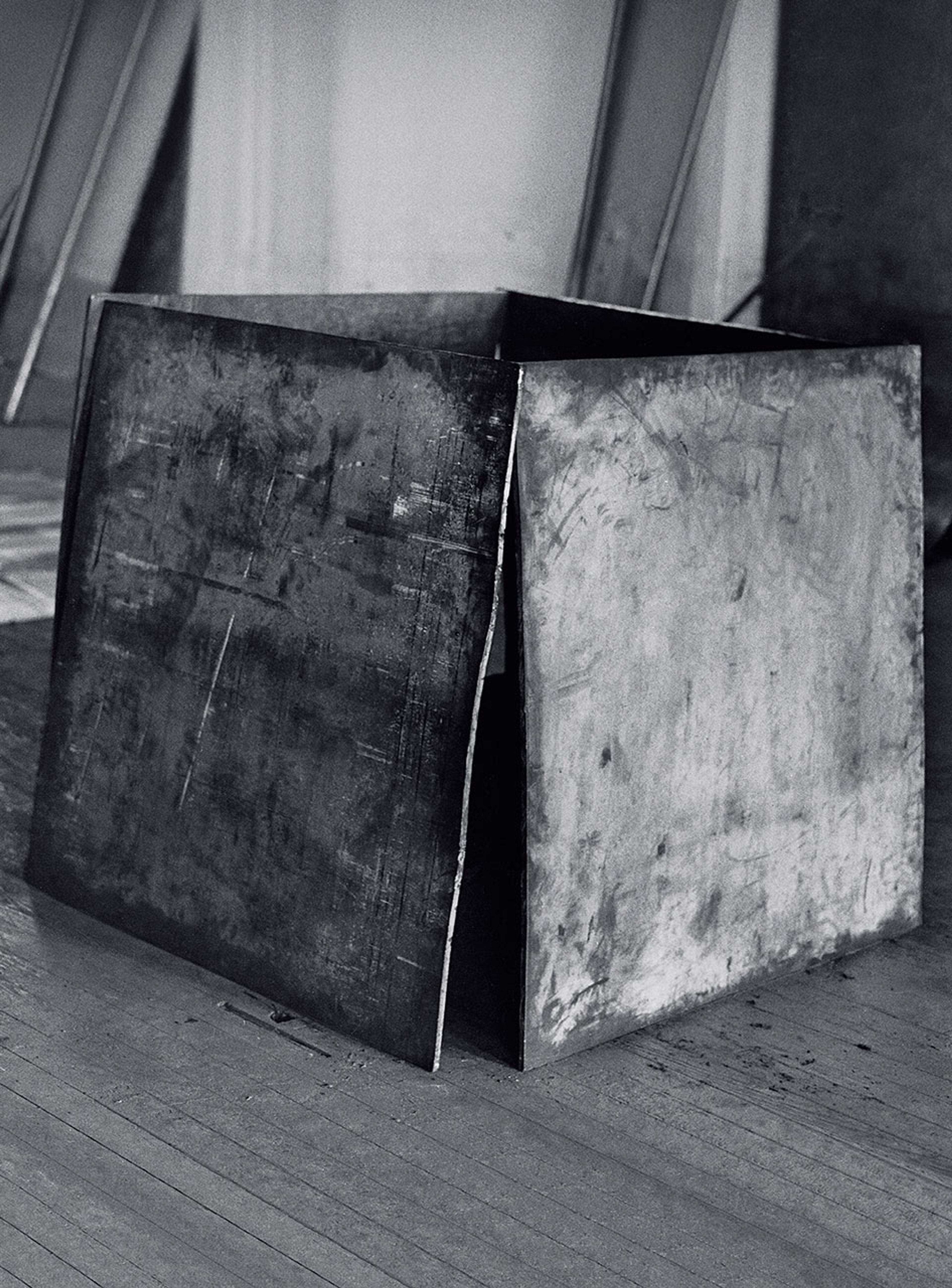 A lead sculpture by Richard Serra titled One Ton Prop (House of Cards), dated 1969.