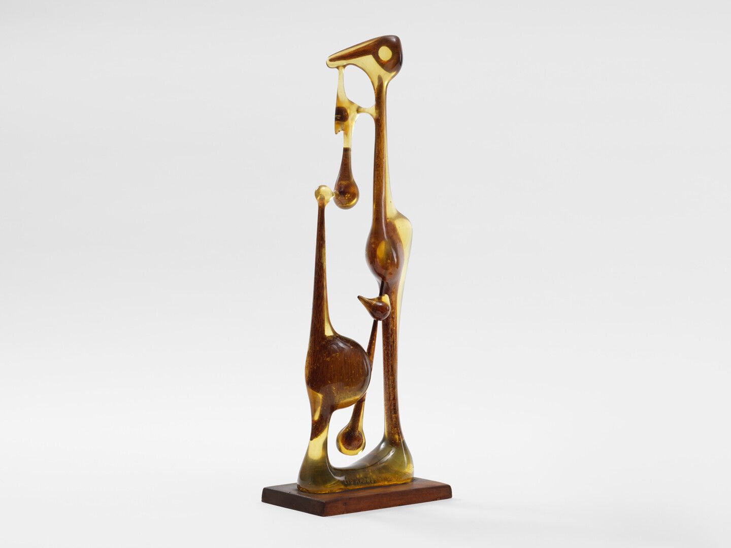 A polyester resin and wood sculpture by Leo Amino, titled Winter Scene, dated 1951.
