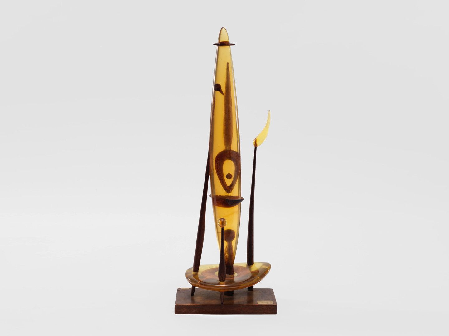A polyester resin and wood sculpture by Leo Amino, titled Stamen, dated 1951.