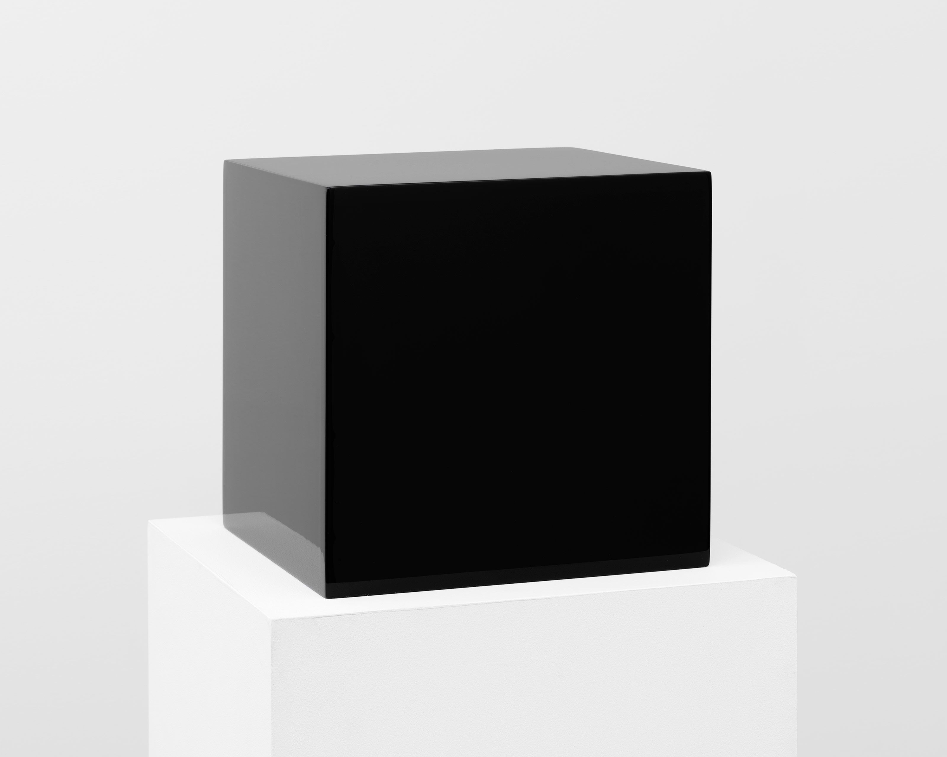 A polyester resin, fiberglass, and plywood sculpture by John McCracken, titled 12-IV, dated 1971.