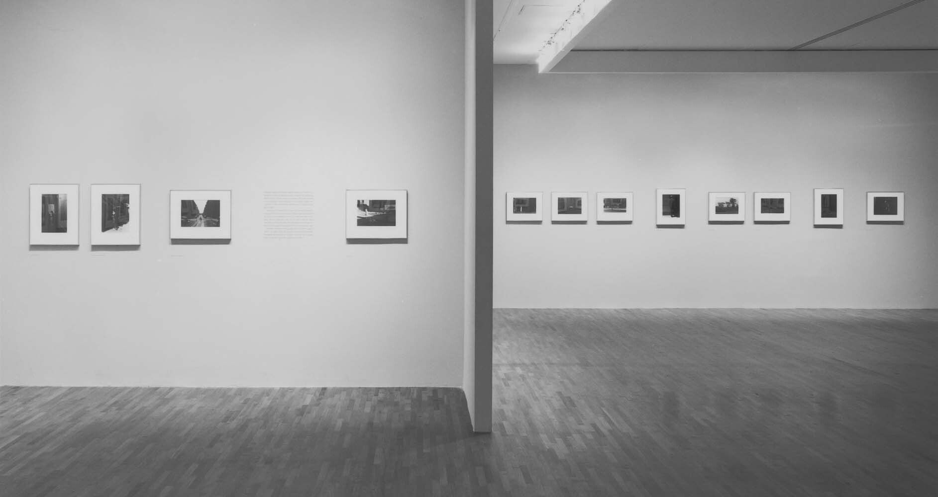 An installation view of an exhibition, titled Roy DeCarava: A Retrospective, at the Museum of Modern Art, New York, in 1996.