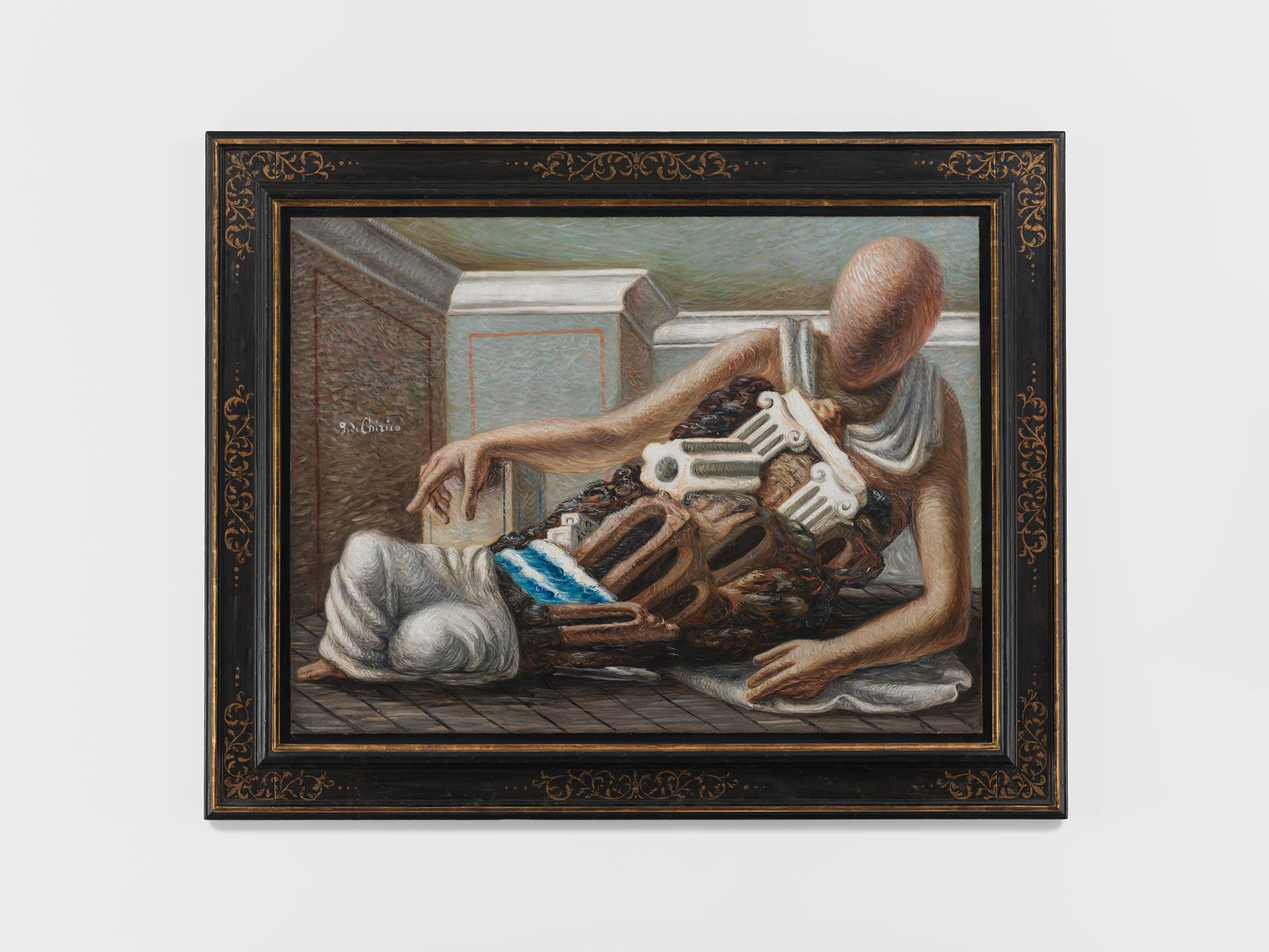 A painting by Giorgio de Chirico, titled L'archeologo, translated as the Archaeologist, dated 1927.