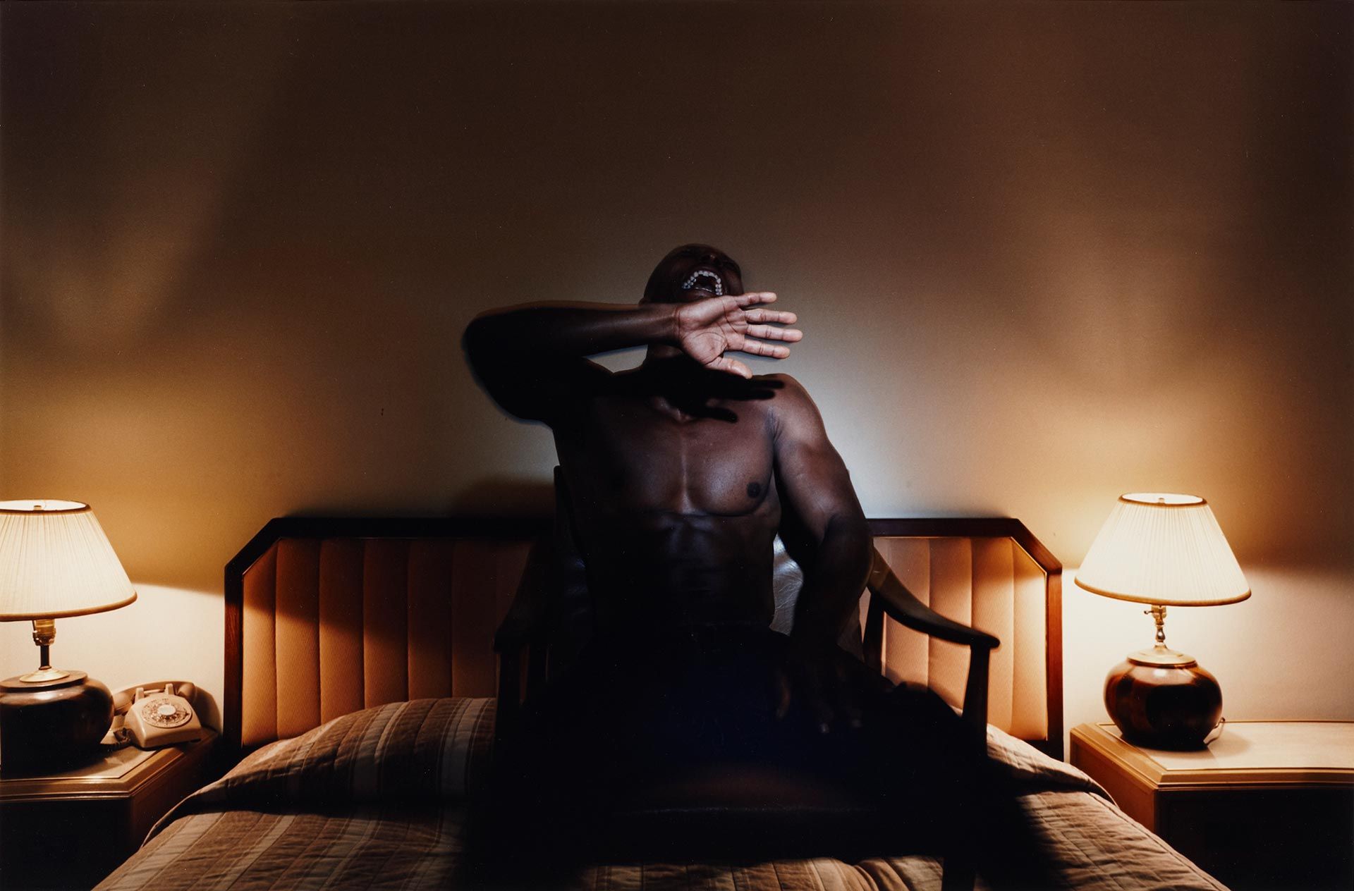 A photograph by Philip-Lorca diCorcia, titled David Theodore Lane, 27 years old, Tucson, Arizona, $30, dated from 1990 to 1992.