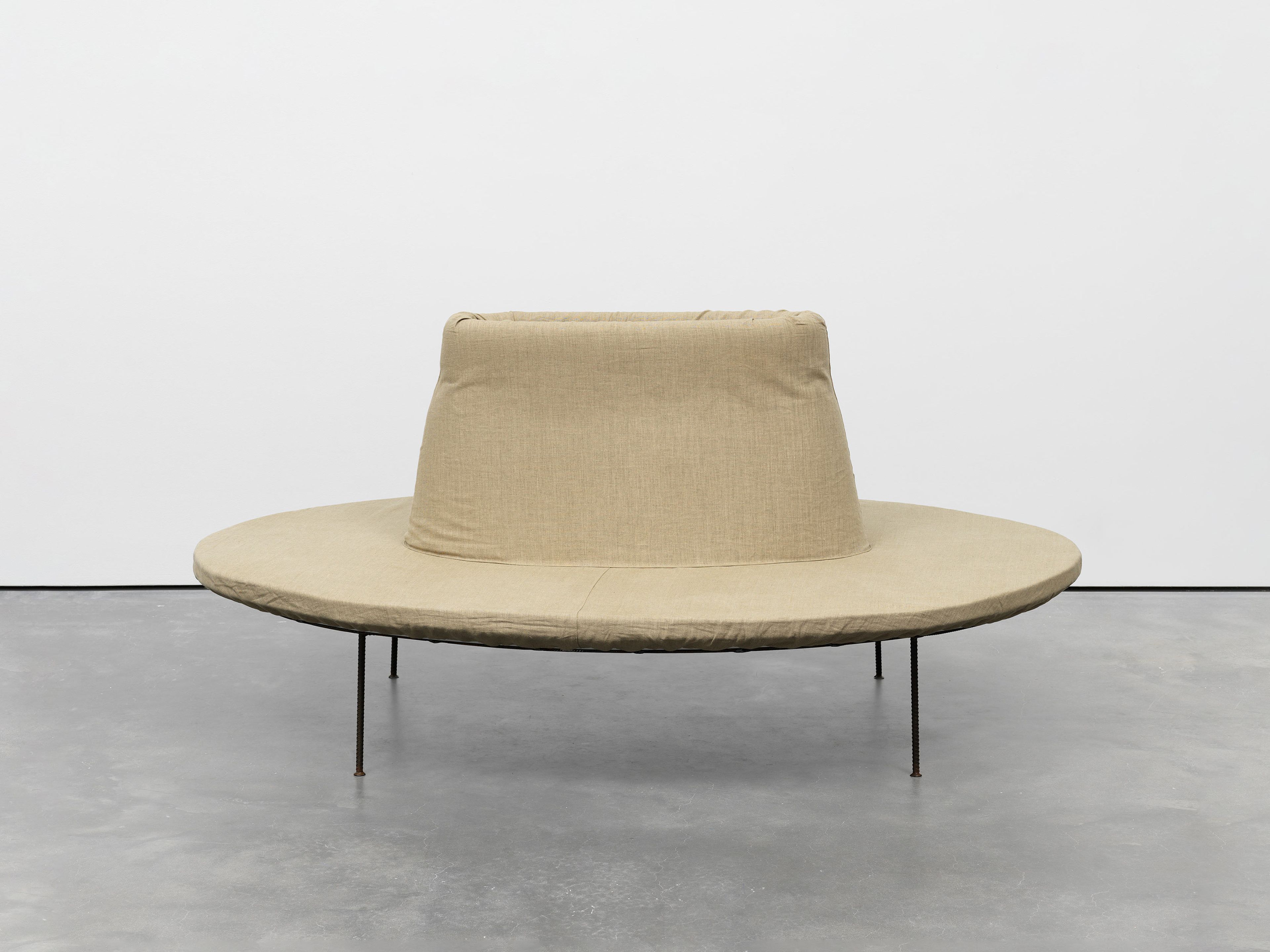 A piece of furniture by Franz West, titled Pouf, dated 2000.