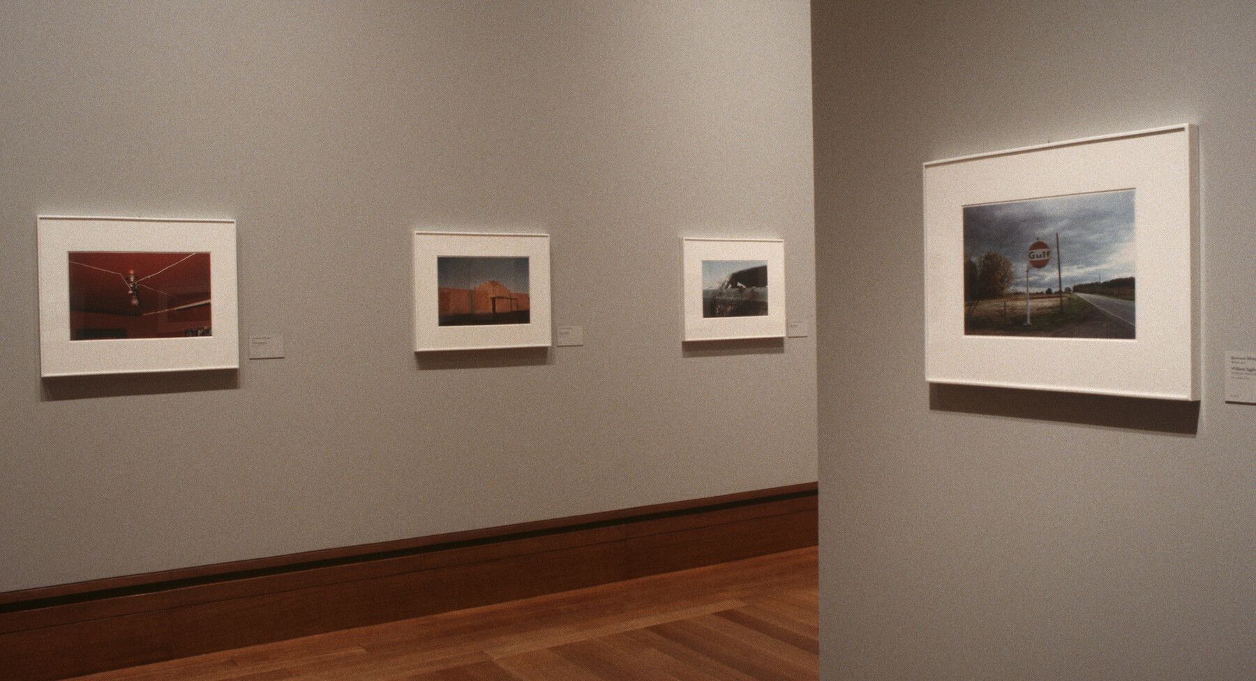 An installation view from an exhibition titled William Eggleston and the Color Tradition at the J. Paul Getty Museum in 1999.